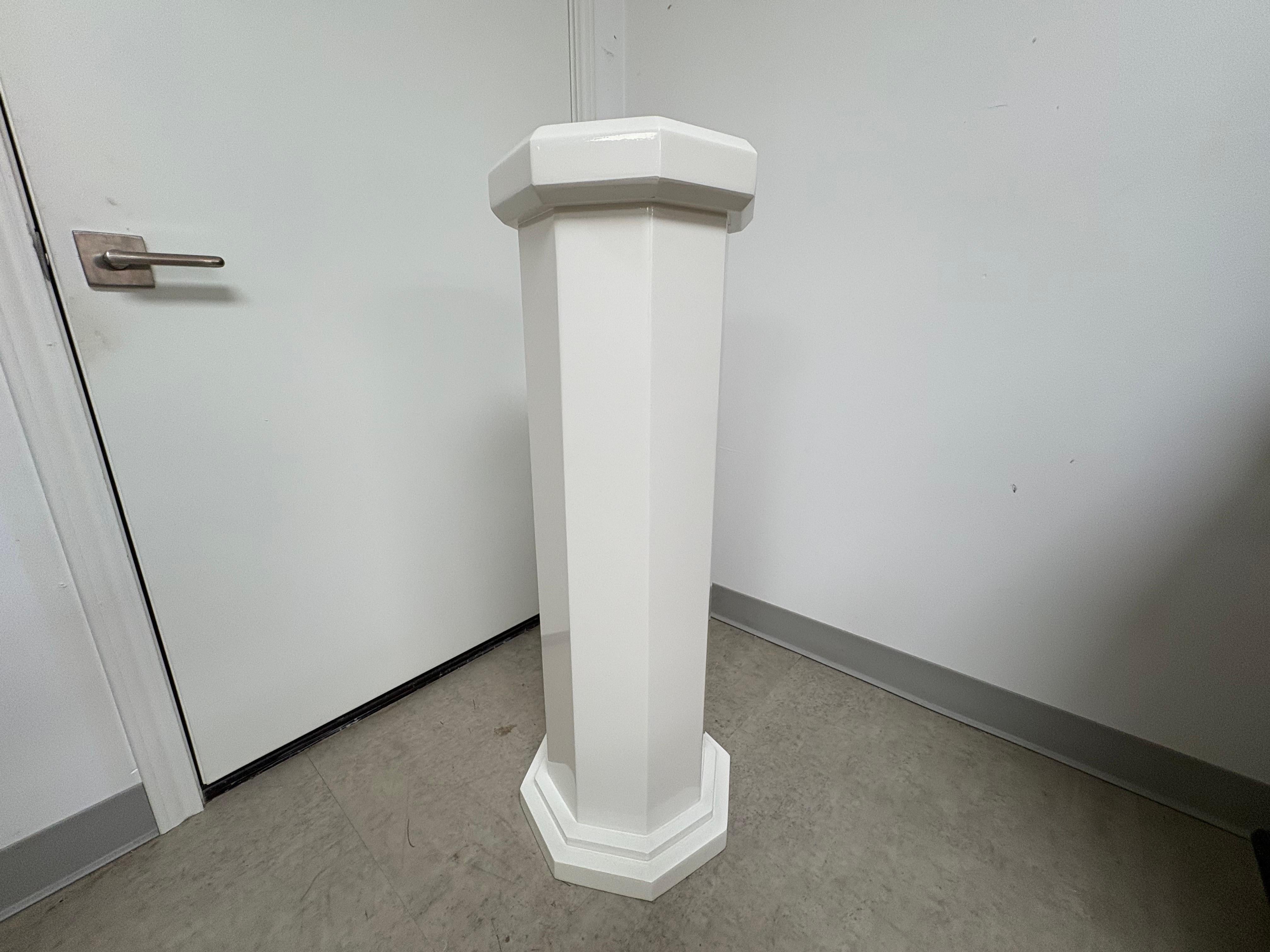 Post Modern Octagonal Lacquered Pedestal.
Offered is a beautiful Hollywood Regency or Post Modern Lacquered Pedestal.
This stunning pedestal is the perfect accent to display your prized sculpture or bust.
The simplistic design won't compete with