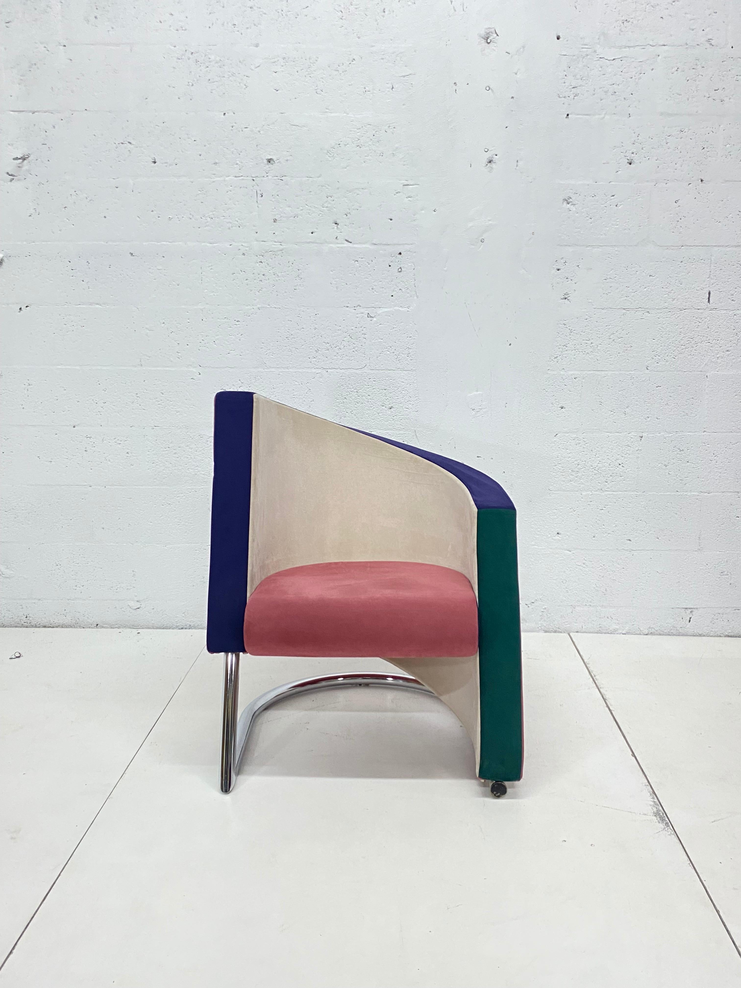 Pair of multi-color ultra-suede postmodern opposing club or lounge chairs produced by Westnofa, Chicago. Chairs are produced with foam over a steel frame and attached to a tubular chrome base. Upholstery is original and there is some puffiness on