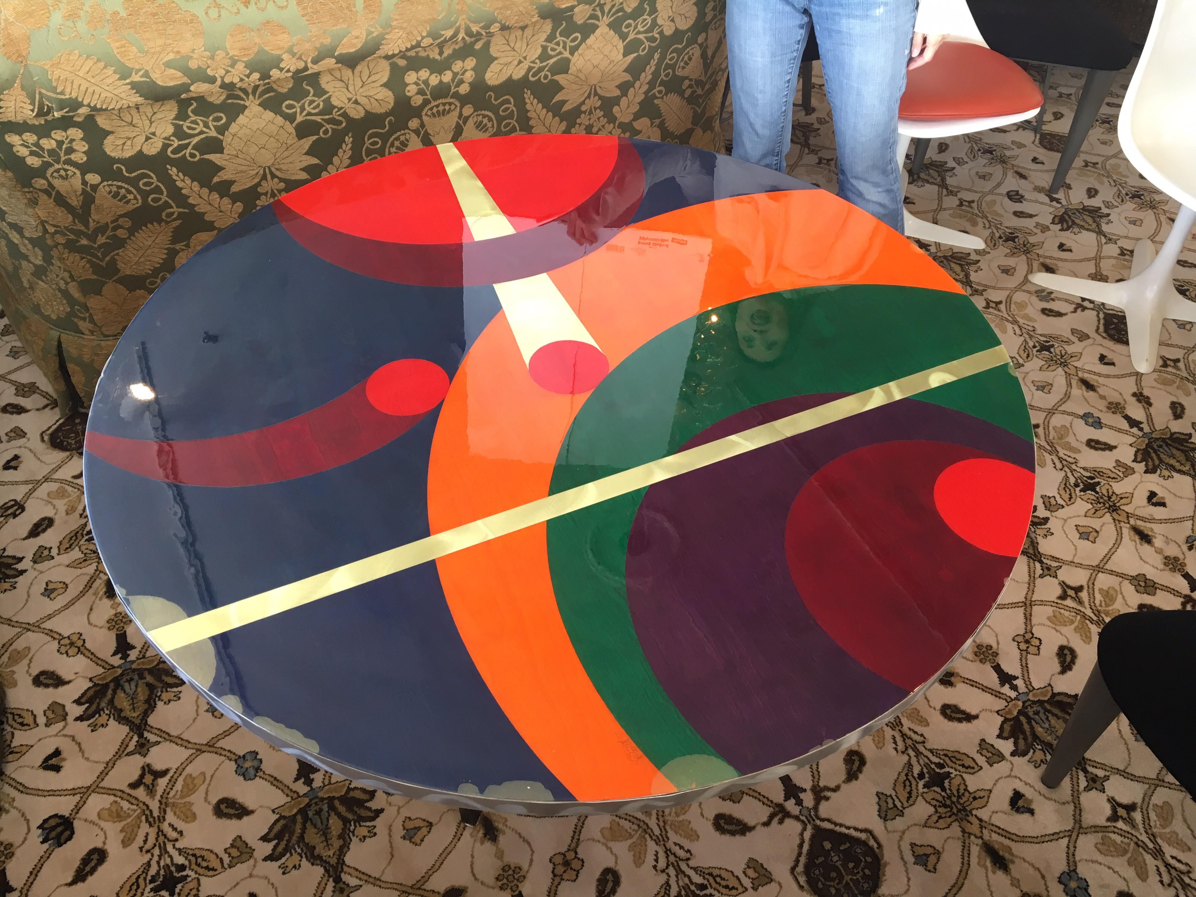 Artist-signed Postmodern round dining or kitchen table. Artist signature is at top of table and is hard to decipher - could be 