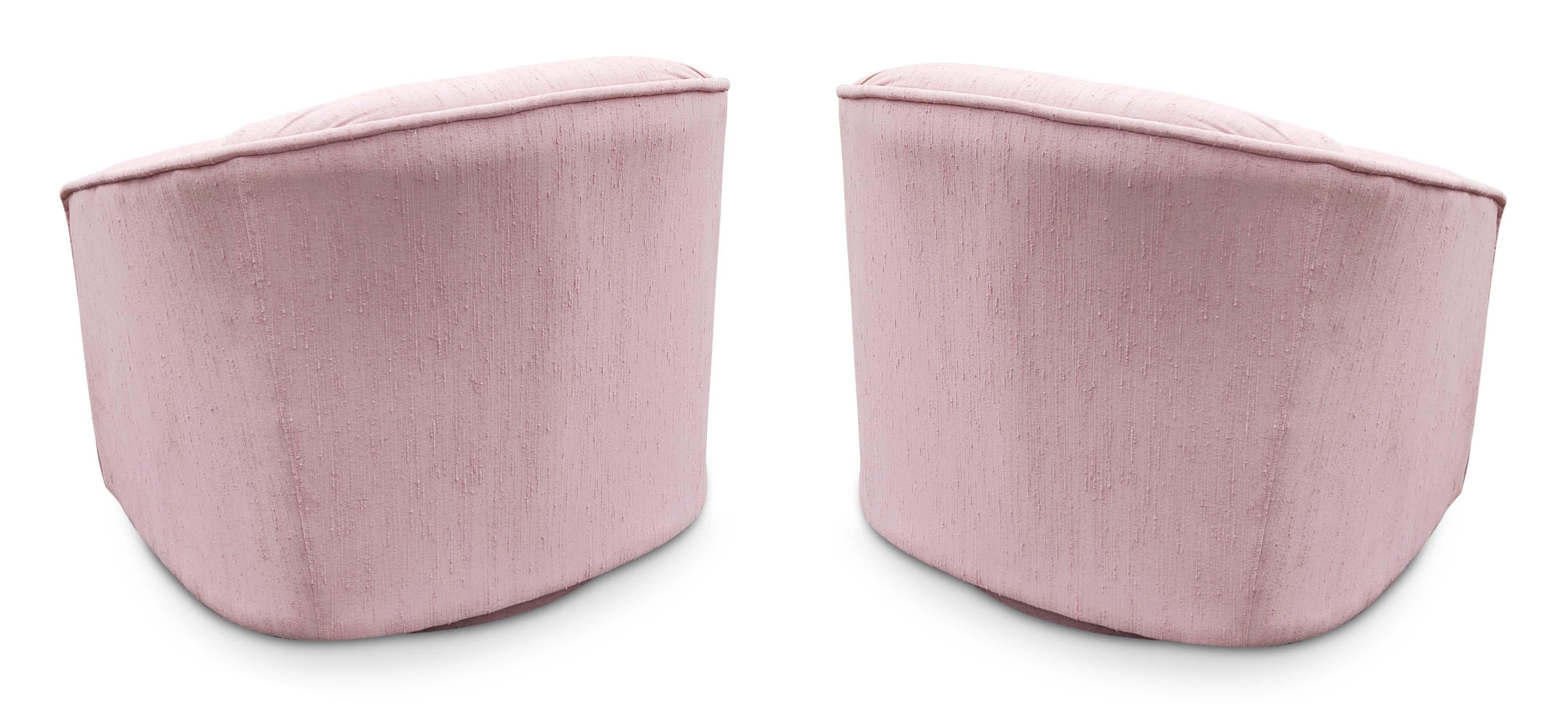 Fresh from the original home, now presented to you, a pair of 1980s barrel-form pink upholstered lounge chairs in very good vintage and original condition. Classic barrel form lounge chair with tailored styling. They are ready to use in as-is