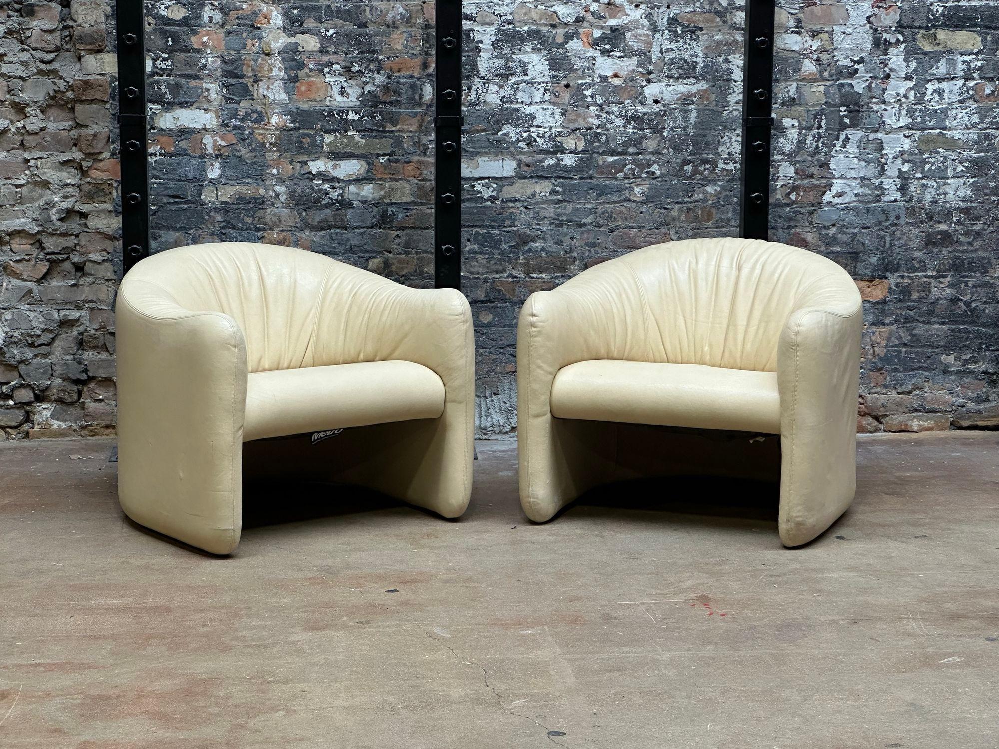 Post Modern Pair Leather Lounge Chairs by Jules Heumann for Metropolitan Furniture, 1980. As shown in pictures there is some minor wear to the leather.
Measures 32