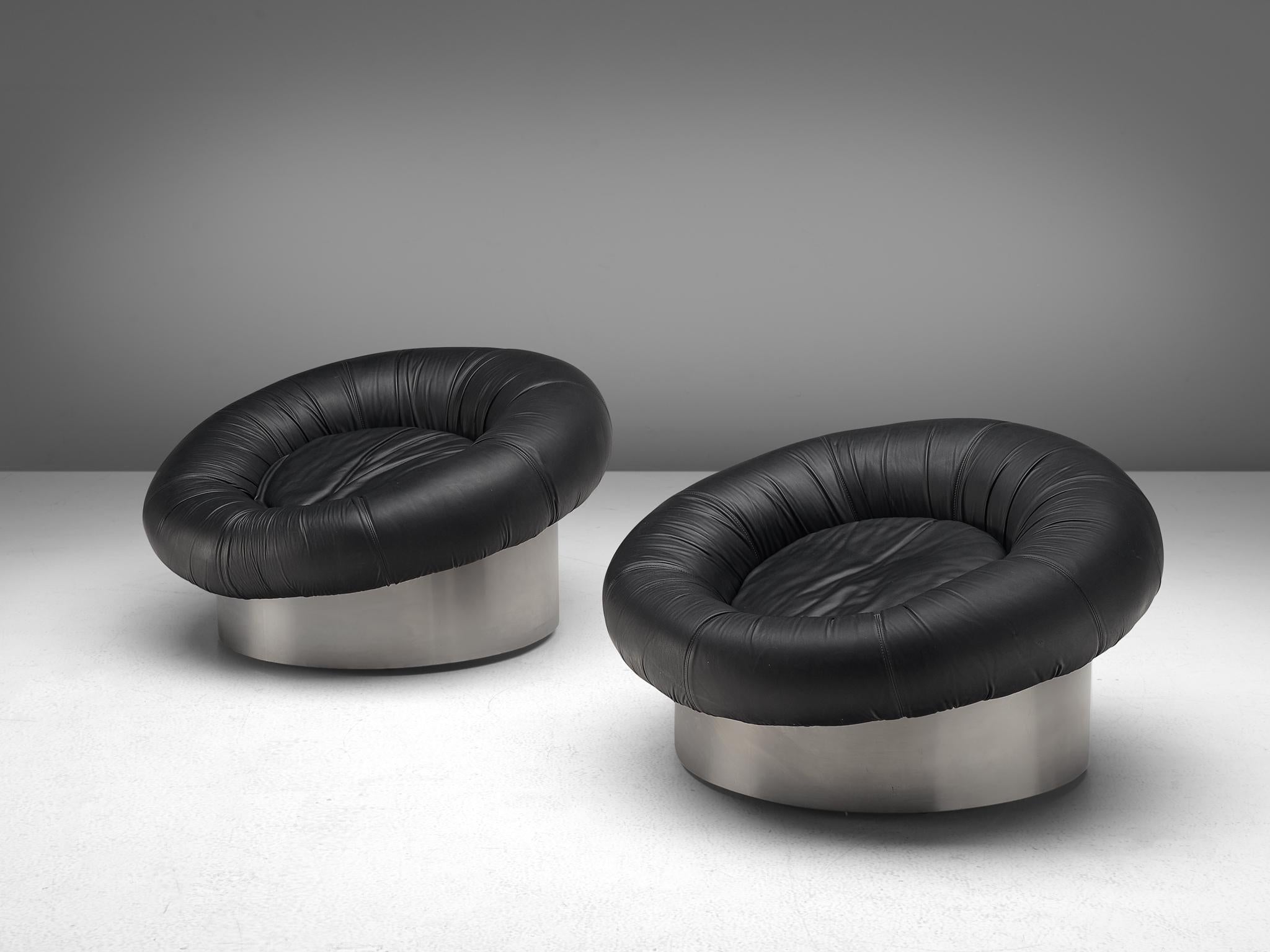 Set of club chairs, attributed to Willy Rizzo, leatherette and steel, Italy, 1970s.

This wonderful Hollywood style pair of chairs show strong characteristics of Italian designers Willy Rizzo, and therefore attributed to him. The chairs are solid