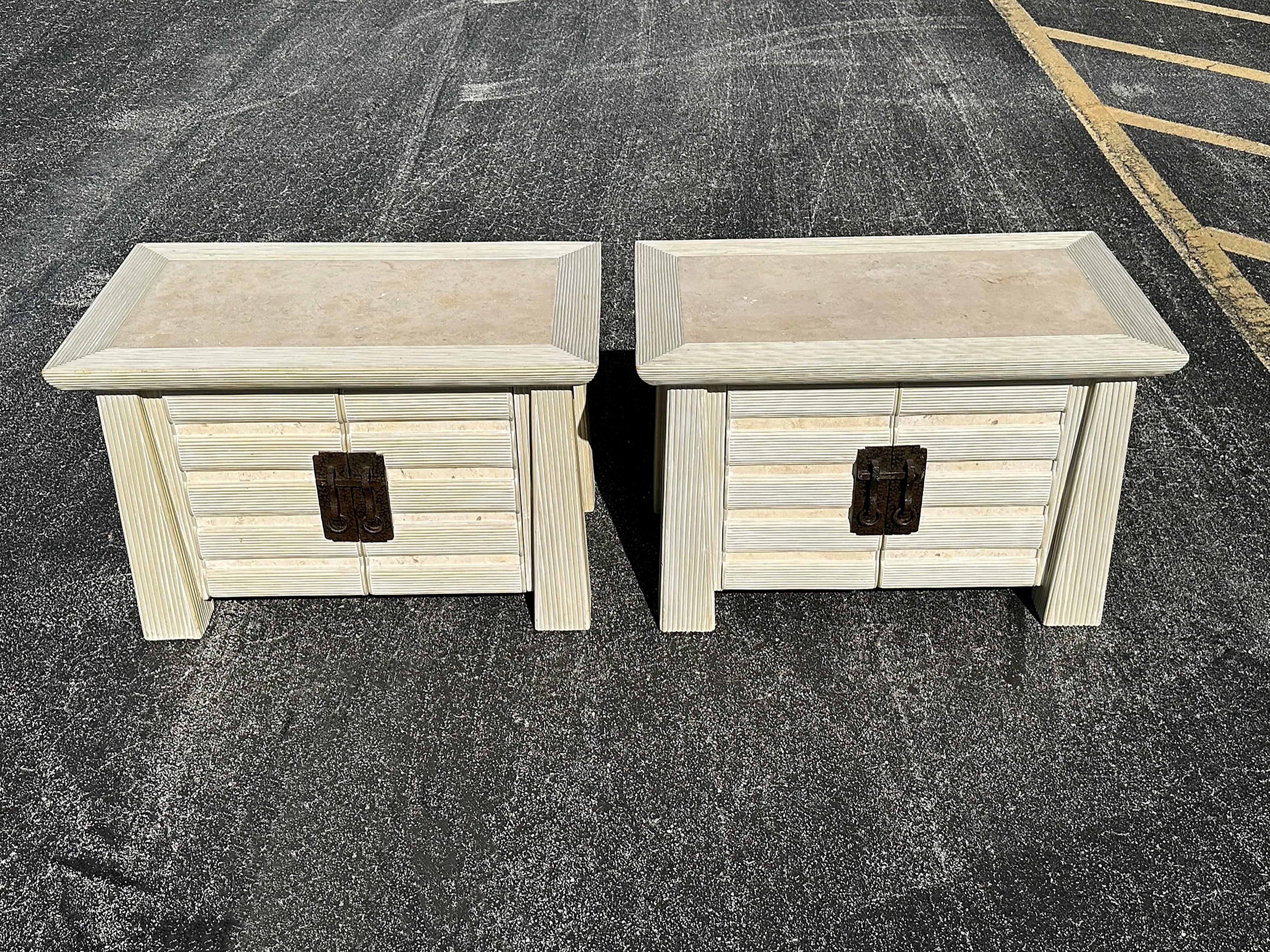 Vintage post modern pair of pagoda side tables, pencil reed frames with travertine stone top and sides. Unique hammered metal closure. Finished on the back so they can be placed anywhere in the room. Heavy duty quality construction. These commodes