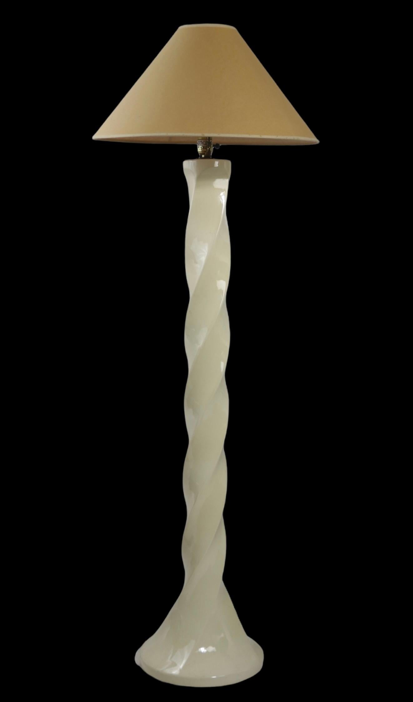 Chic voguish glazed ceramic twist form post modern floor lamp, in very good original condition clean, working and ready to use.
Sophisticated white on white color way, modern design, usable in both modern and traditional interior spaces.
 Total H
