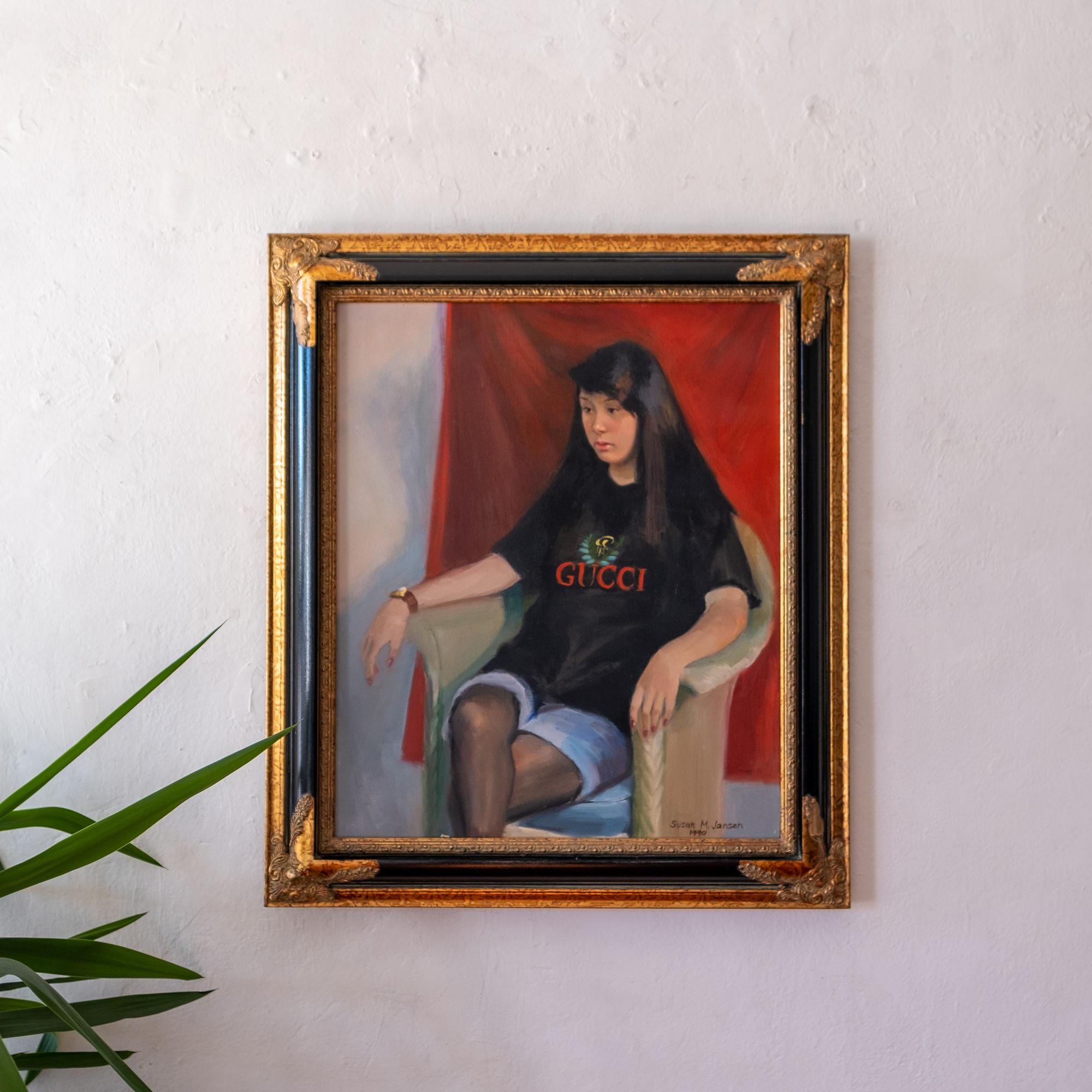 Compelling amateur painting of a misanthropic teenage girl wearing a Gucci t-shirt. The ostentatious gilded frame (Made in Mexico) only adds to the charm. Signed and dated, 1990.