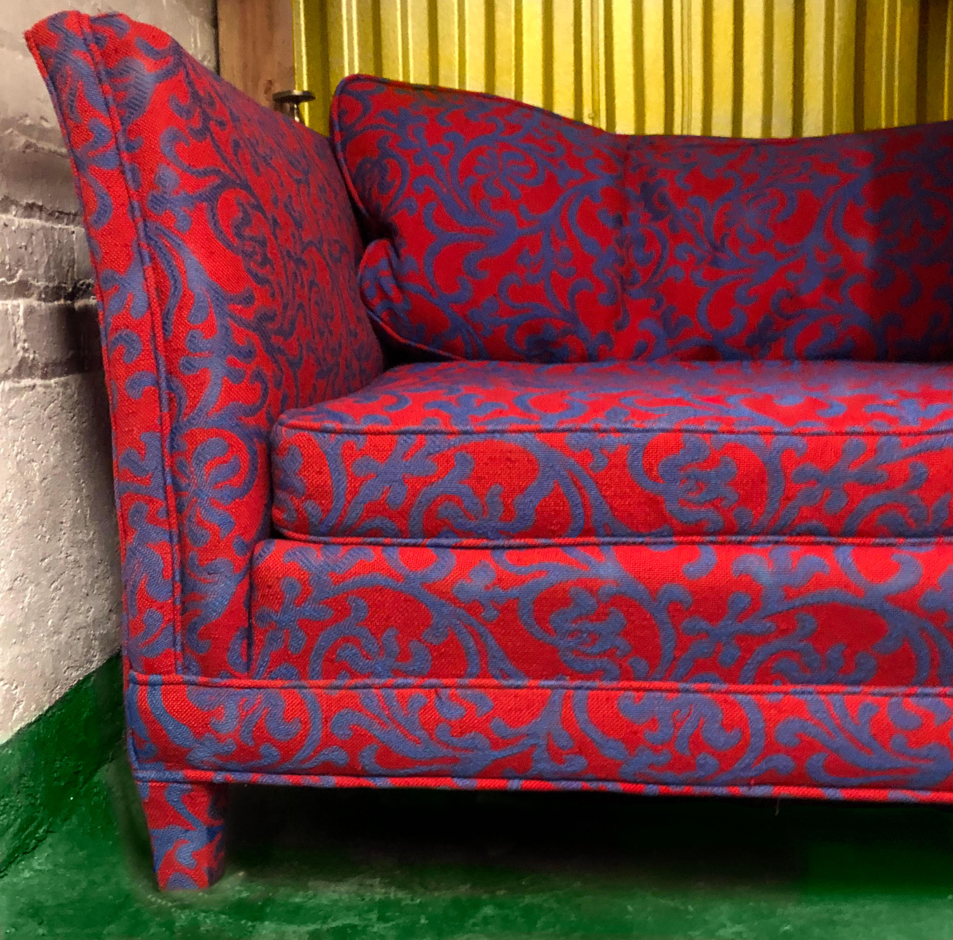 Custom, striking, unexpected juxtapositions of classics - color (red and blue), pattern (Jacobean and coral motifs) and form (table) vs texture (soft textile) Fresh and intelligent, this custom sofa and sofa table set at e treasures not to be