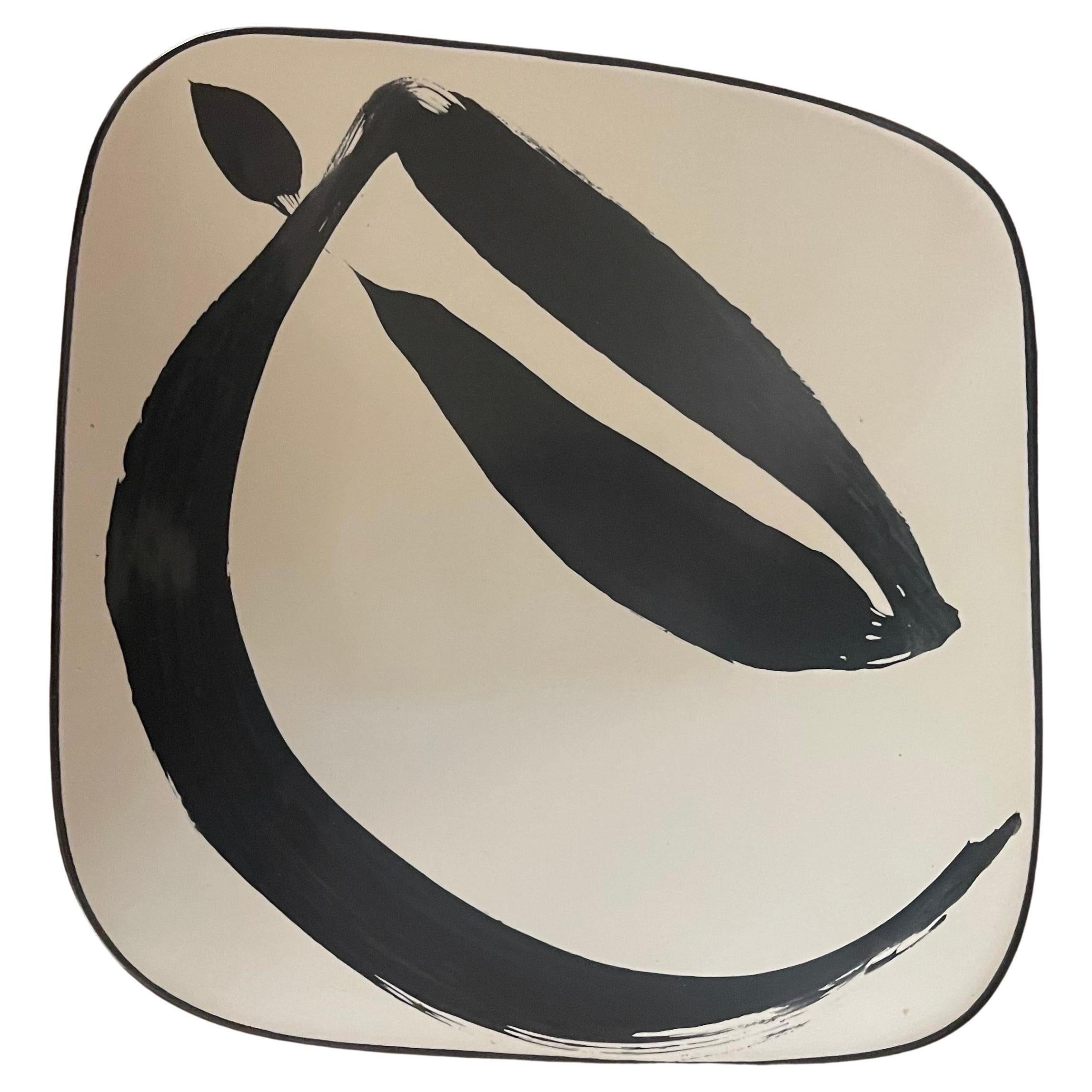 A very attractive post-modern rhombus shaped ceramic bowl by Ann Mallory for Americaware, circa 1990s. Designed by art potter Ann Mallory, this beautiful bowl features a large, gestural pattern hand-painted in the style of Japanese calligraphy.