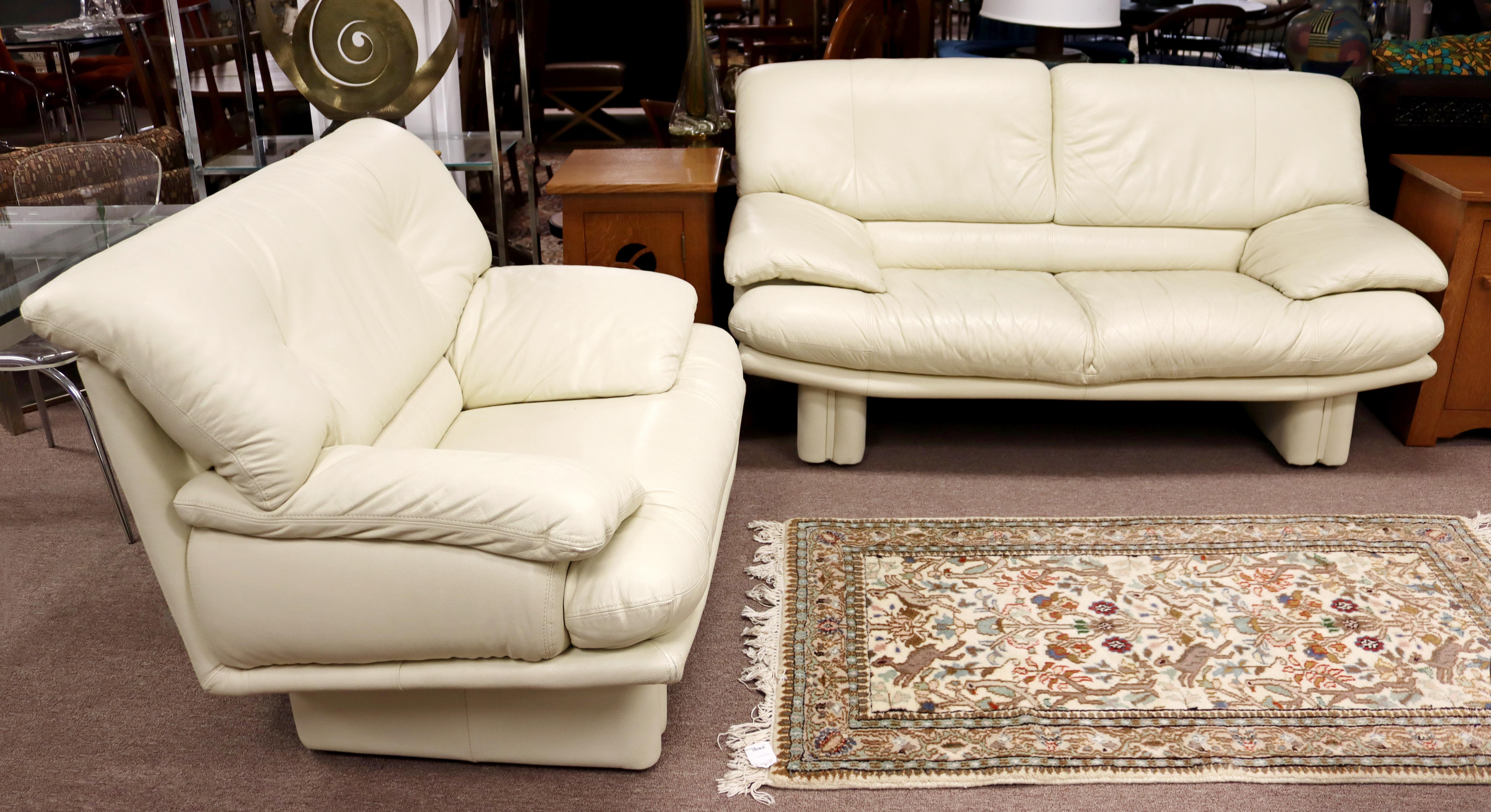 For your consideration is a comfortable and chic sofa and lounge chair set. In excellent condition. The dimensions of the chair are 46