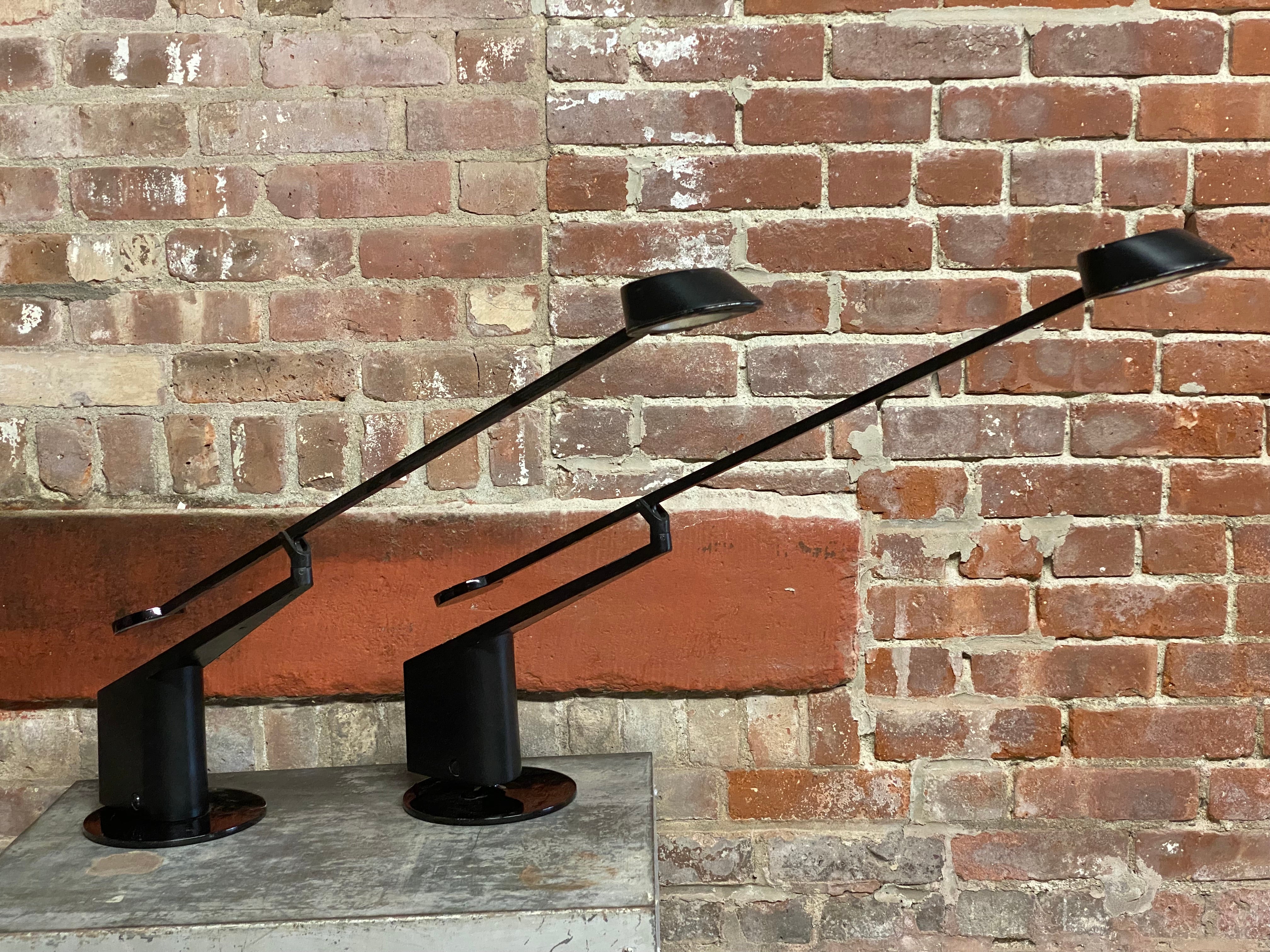 A fine pair of Rodolfo Bonetto ALA high intensity task lights for iGuzzuni, Italy. Fully articulated and wonderfully balanced. They swing, they dance, they move to suit your needs and are held in place by a nicely weighted base. There's no tipping