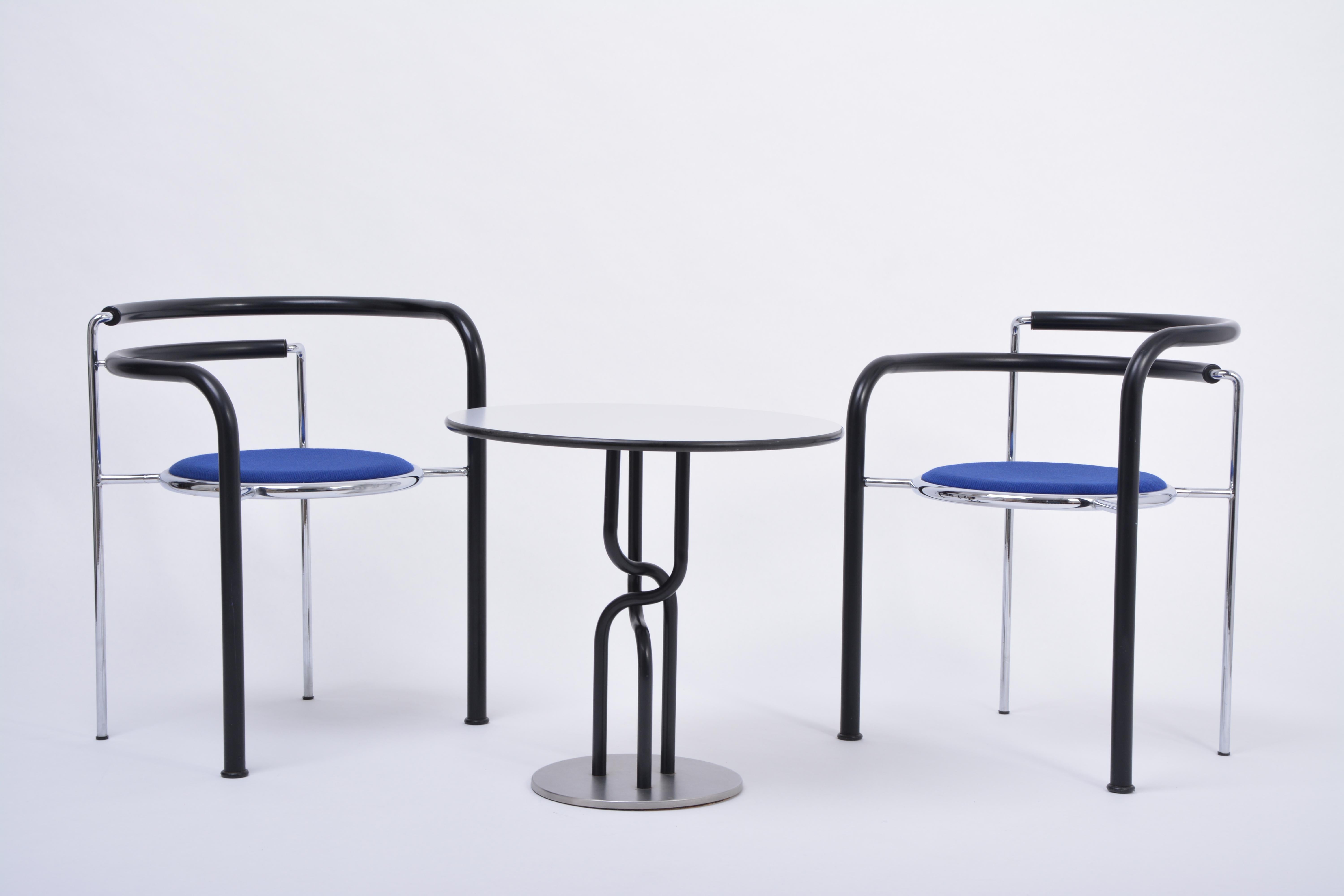 Postmodern seating group by Rud Thygesen & Johnny Sorensen for Botium, 1989

Table and two stacking chairs 