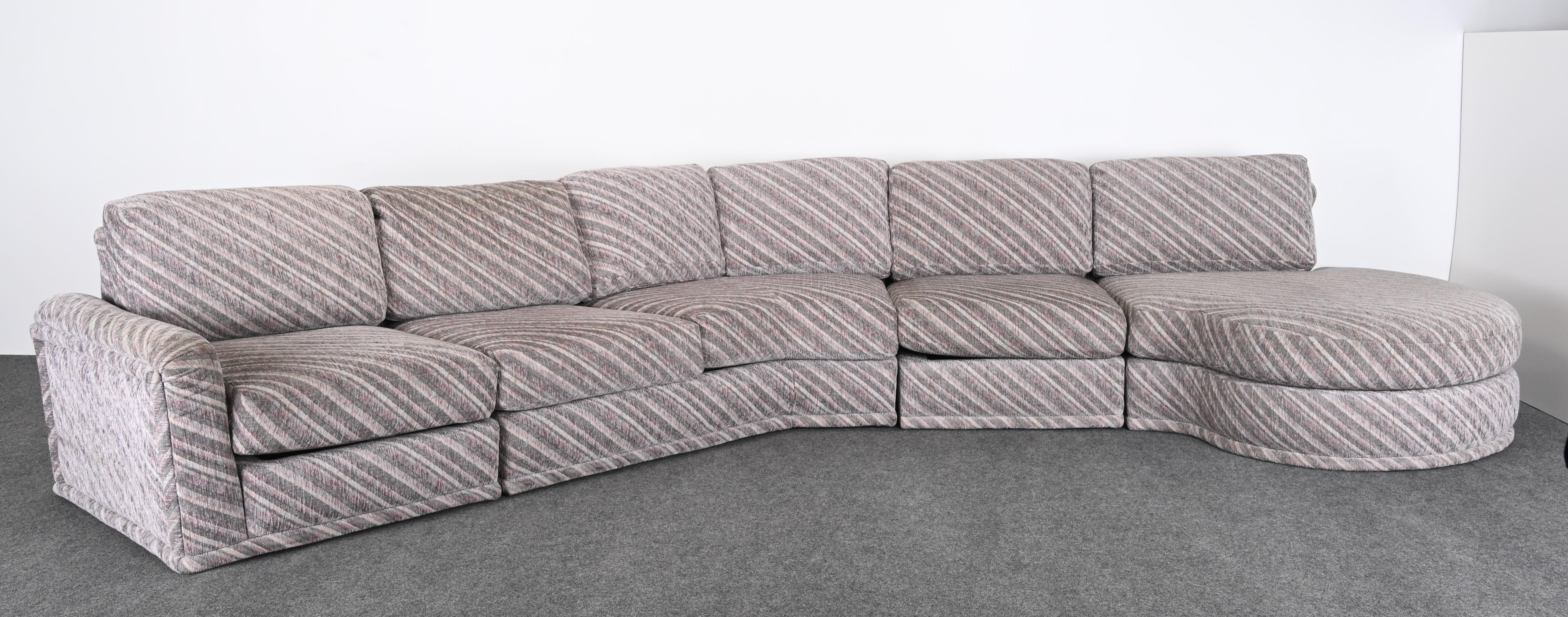 A Post-Modern sectional sofa designed by Milo Baughman for Thayer Coggin. This fabulous sofa came out of a period home and was custom-made circa 1990. This large sofa has additional pieces which can be used alternatively. Both setups are pictured