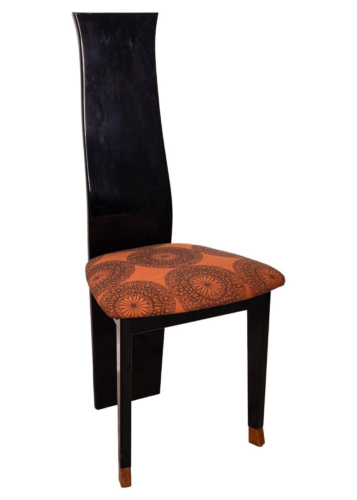 An Italian set of 6 post modern burlwood dining chairs by Pietro Constantini. A gorgeous set of highly unique chairs. This artful set of dining chairs is designed by renowned Italian designer Pietro Constantini. They feature a solid wood design with