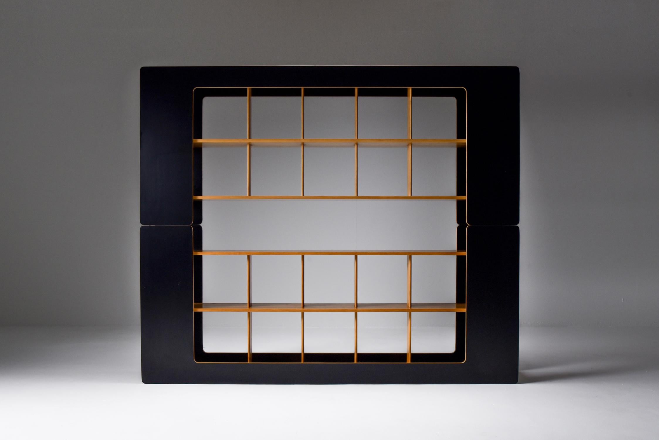 Roberto Pamio and Renato Toso, shelve unit, room divider, Stilwood, Italy, 1972

Unusual post-modern Italian free standing shelve unit in black Formica and blonde wood. A great and rare piece by the avant-garde designers Roberto Pamio and Renato