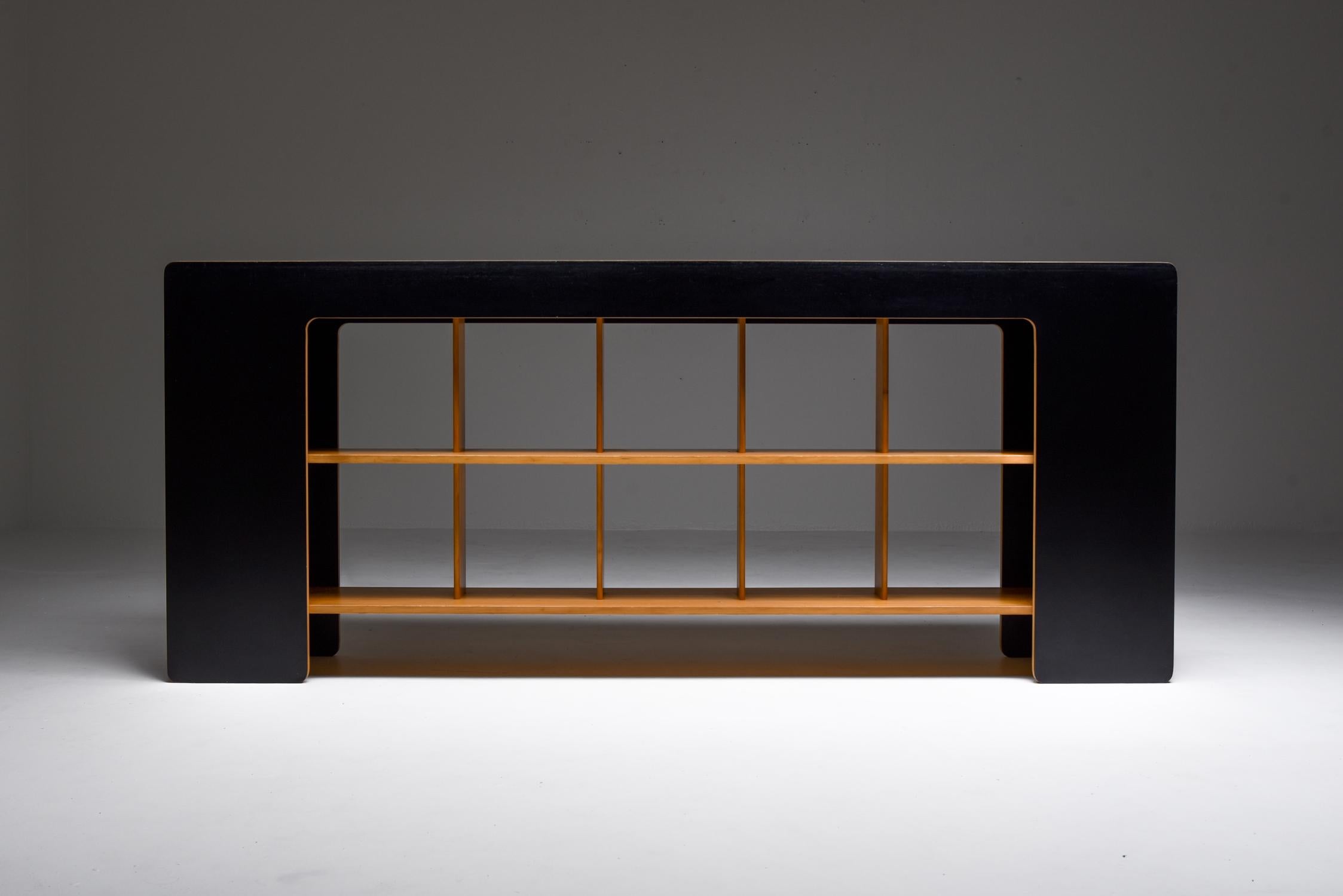 Roberto Pamio and Renato Toso, sideboard with shelves, room divider, Stilwood, Italy, 1972

Unusual post-modern Italian free standing shelve system in black Formica and blonde wood. A great and rare piece by the avant-garde designers Roberto Pamio