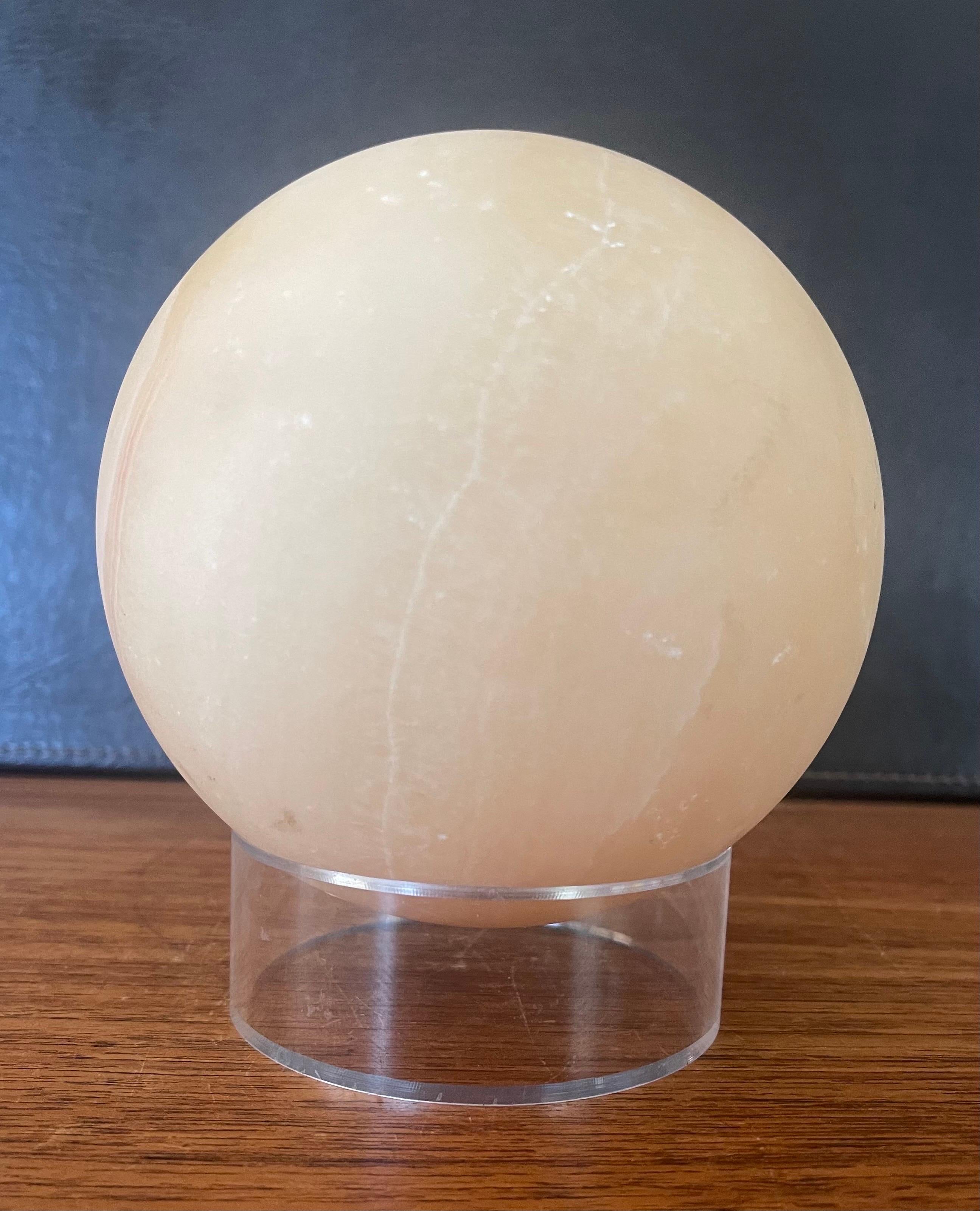 Pakistani Post-Modern Solid Travertine Sphere on Lucite Base For Sale