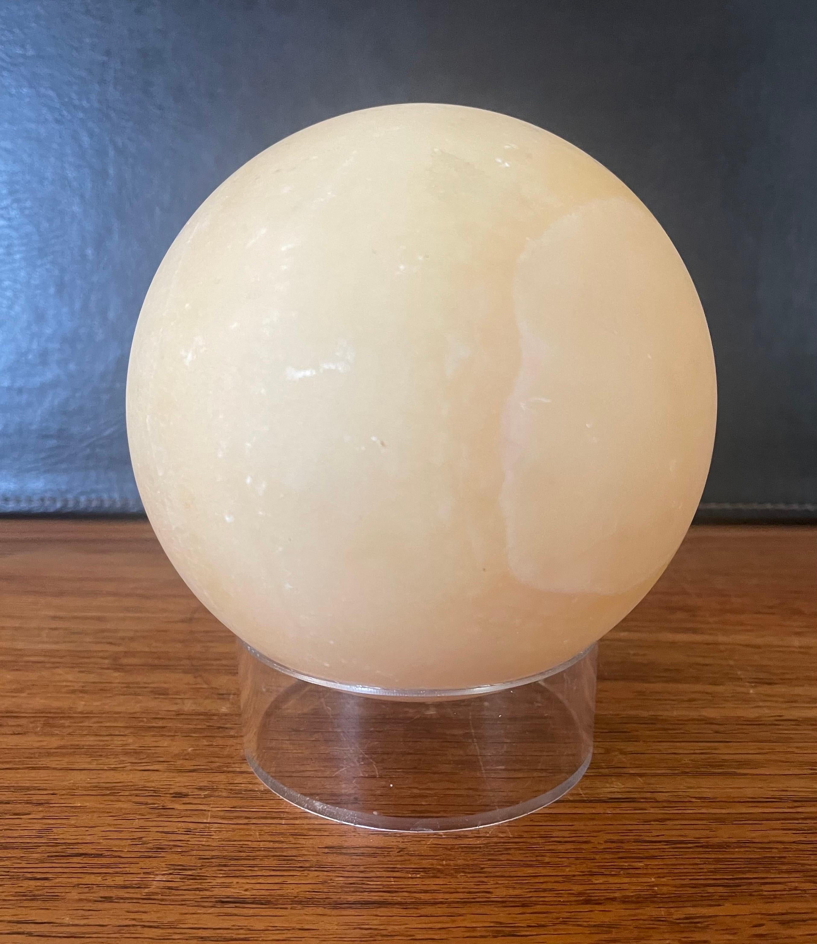 Post-Modern Solid Travertine Sphere on Lucite Base For Sale 1