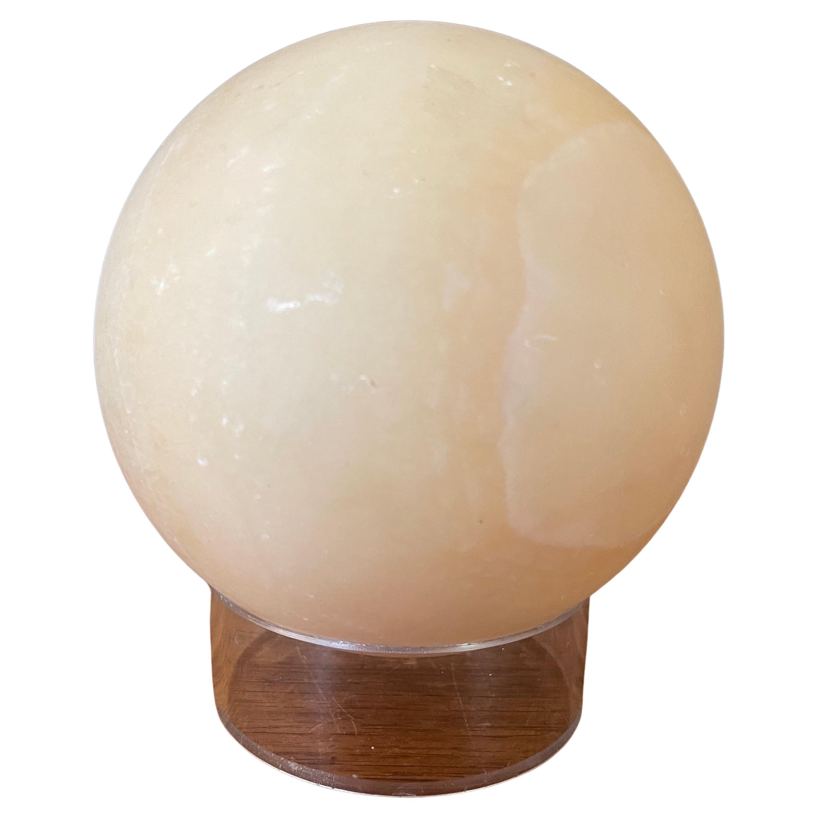 Post-Modern Solid Travertine Sphere on Lucite Base For Sale