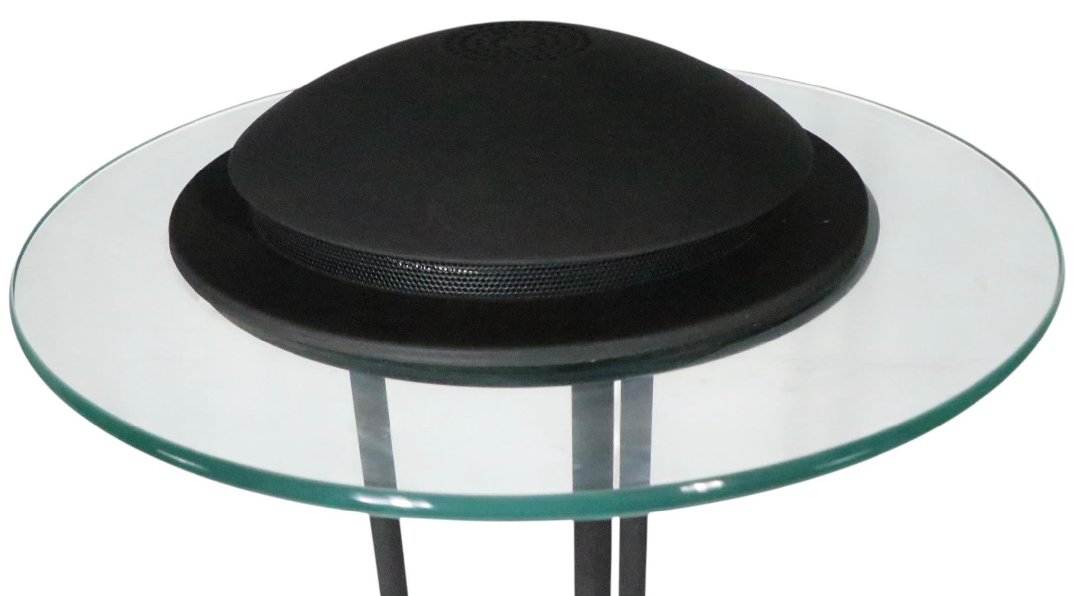 Rare Robert Sonneman designed Post Modern, Memphis style saucer form floor lamp, made in the Netherlands, by Boxland Holland circa 1980/90's. 
 The lamp features a glass ring shade  with black metal fitments, on three vertical tubes, mounted on a