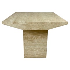 Post modern square side table in natural travertine stone