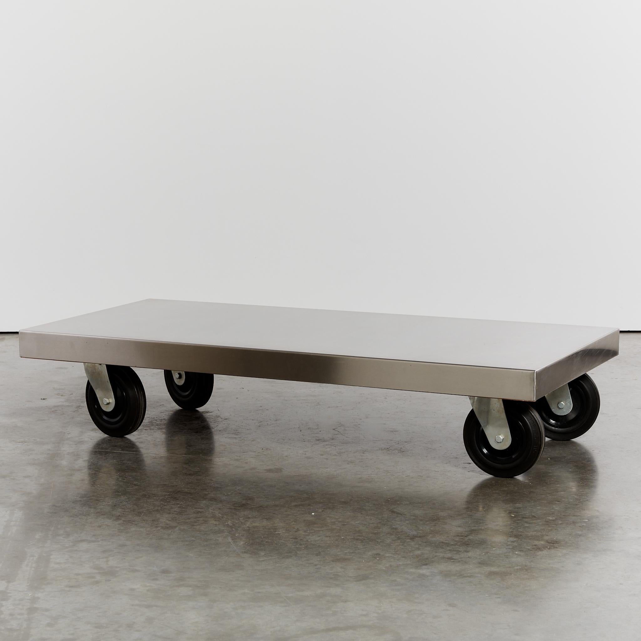 Dutch Post-modern stainless steel coffee table on castors For Sale
