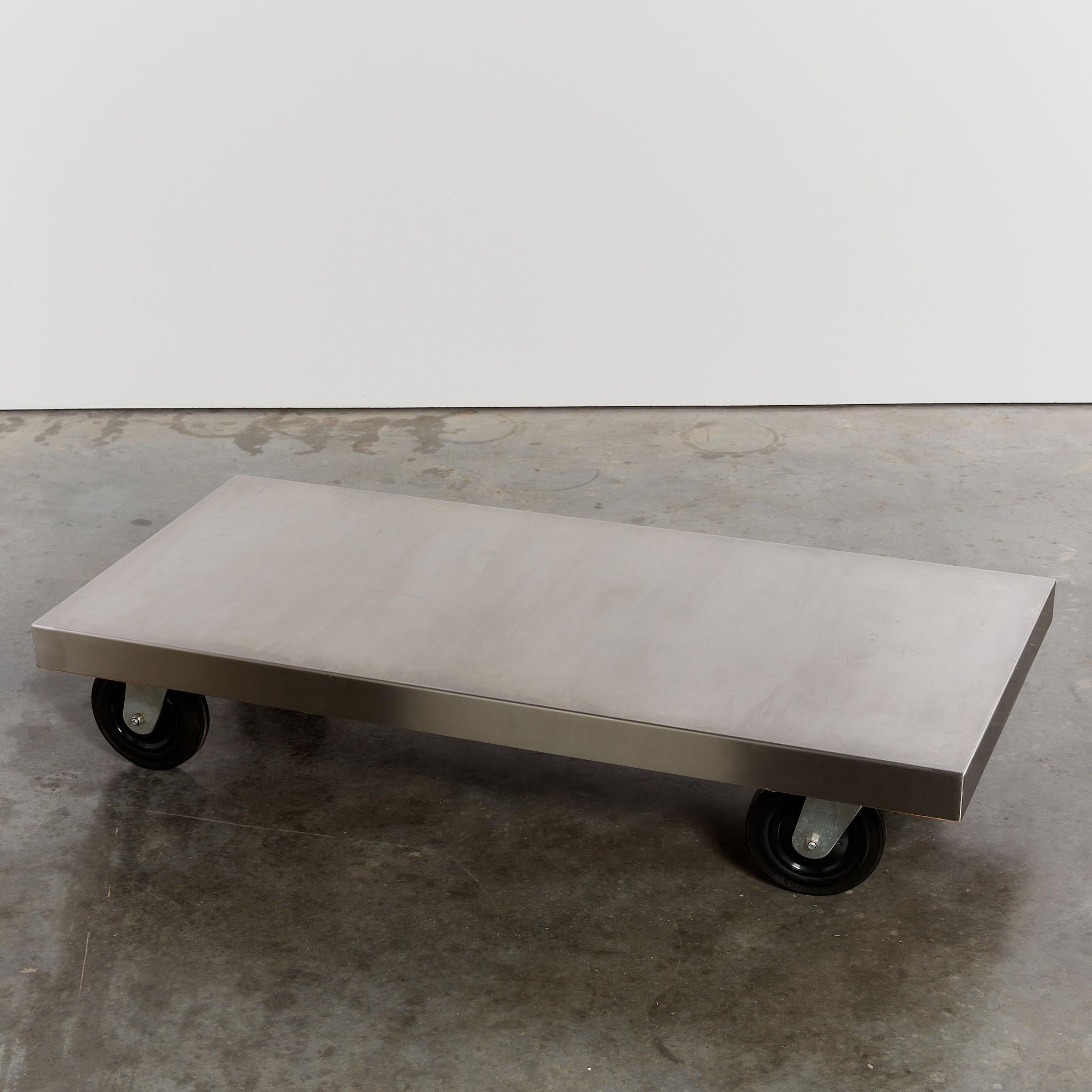 Post-modern stainless steel coffee table on castors For Sale 1