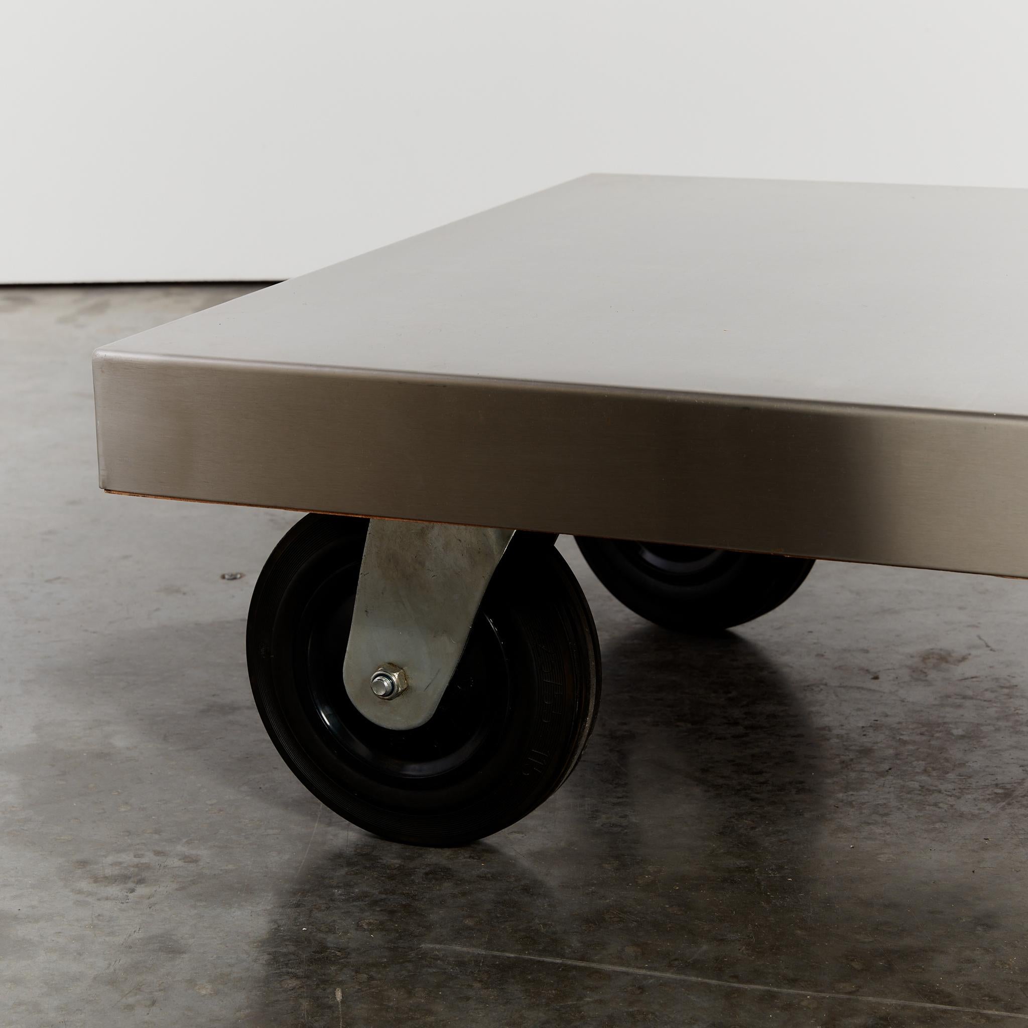 Post-modern stainless steel coffee table on castors For Sale 3