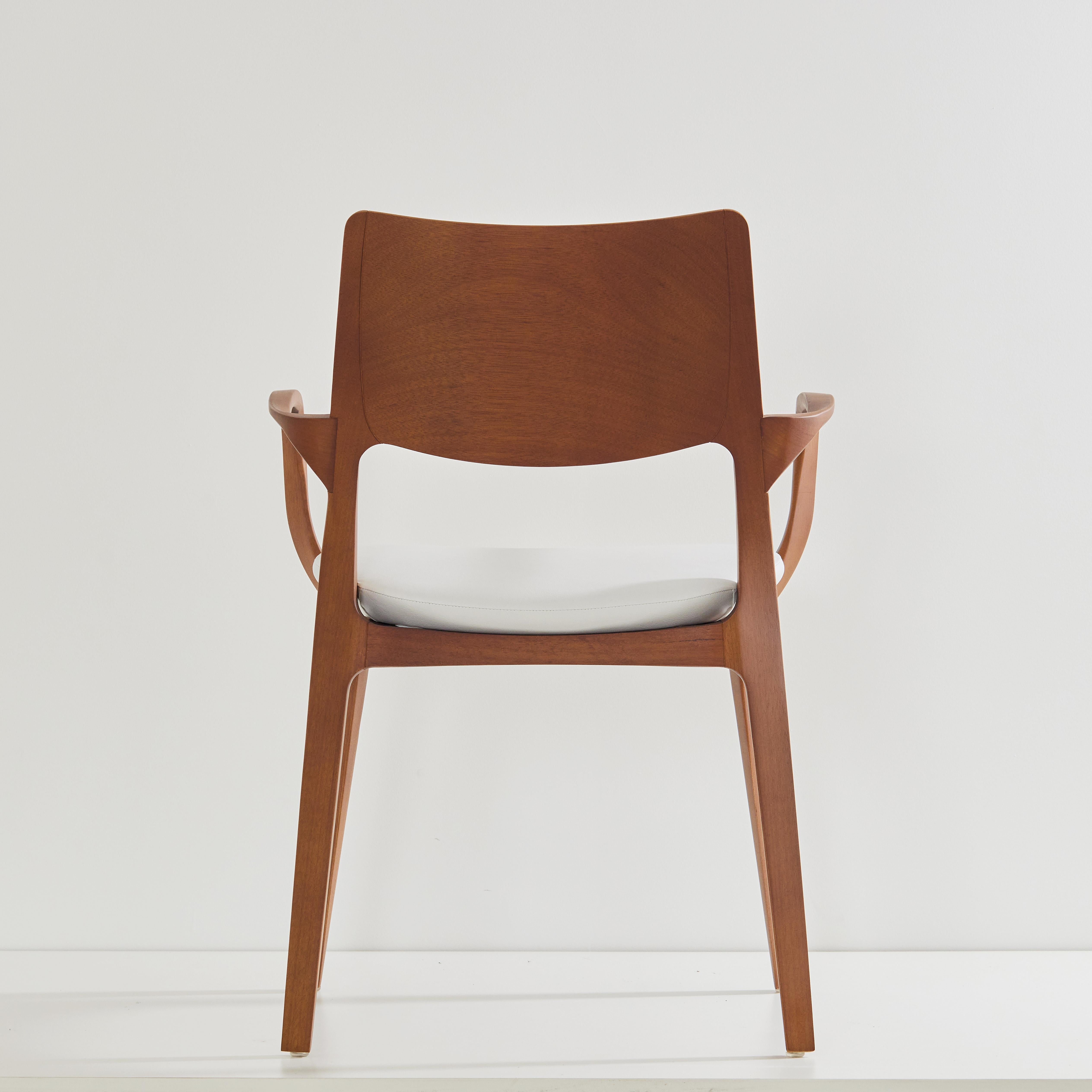 Contemporary Post-Modern Style Aurora Chair in honey solid wood, vegan leather seating For Sale