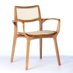 Chaise Aurora de style postmoderne en bois massif avec dossier canné et assise en rotin