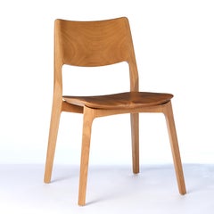 Sedia scolpita Aurora in stile post-moderno con finitura naturale Senza braccioli, seduta solida