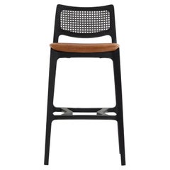 Vintage Post-Modern Style stool, black solid wood, cane back, camel leather seating