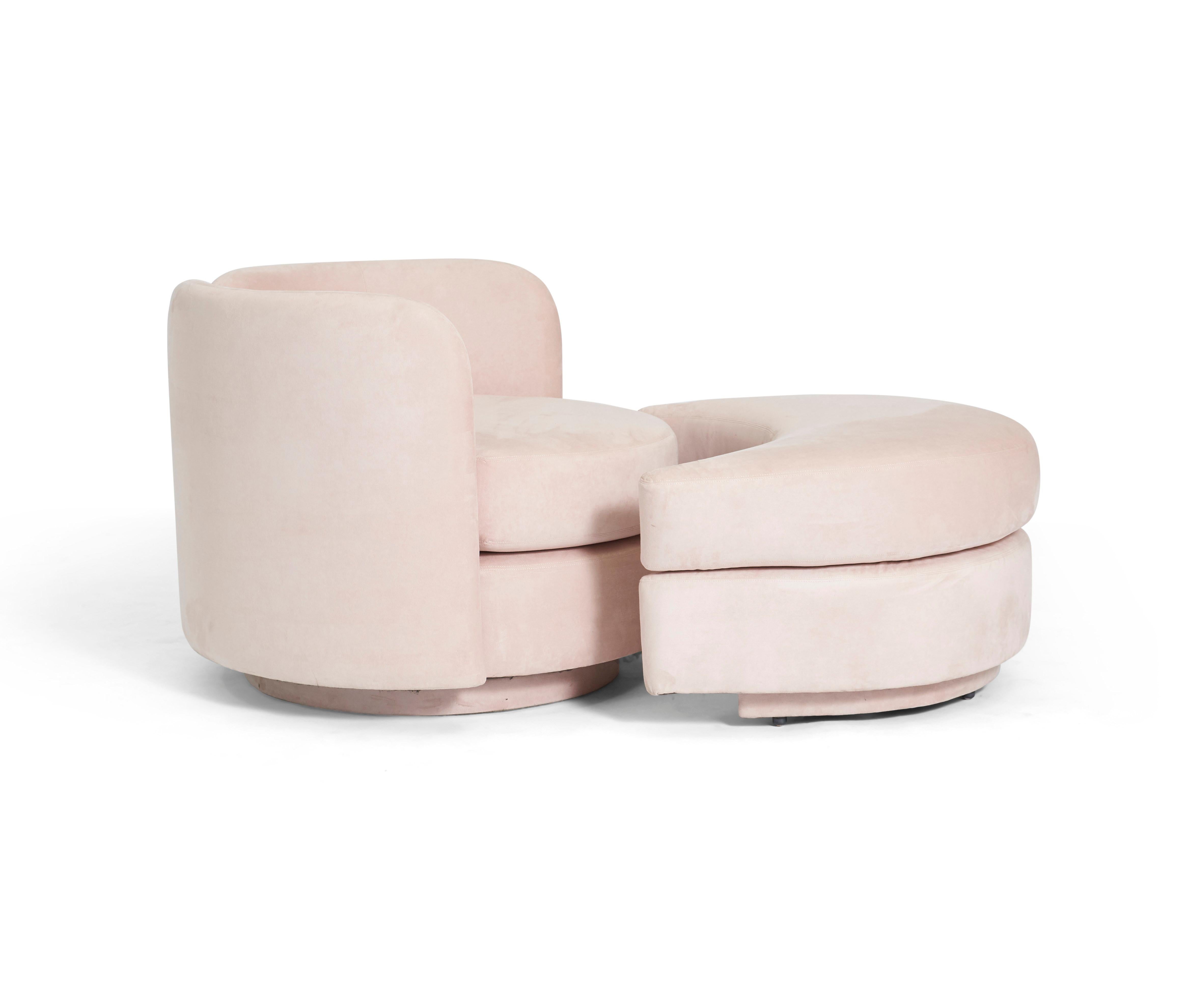 Large scale swivel chair with split back and rolling ottoman. Original pink ultra suede fabric. Postmodern Design attributed to Milo Baughman.