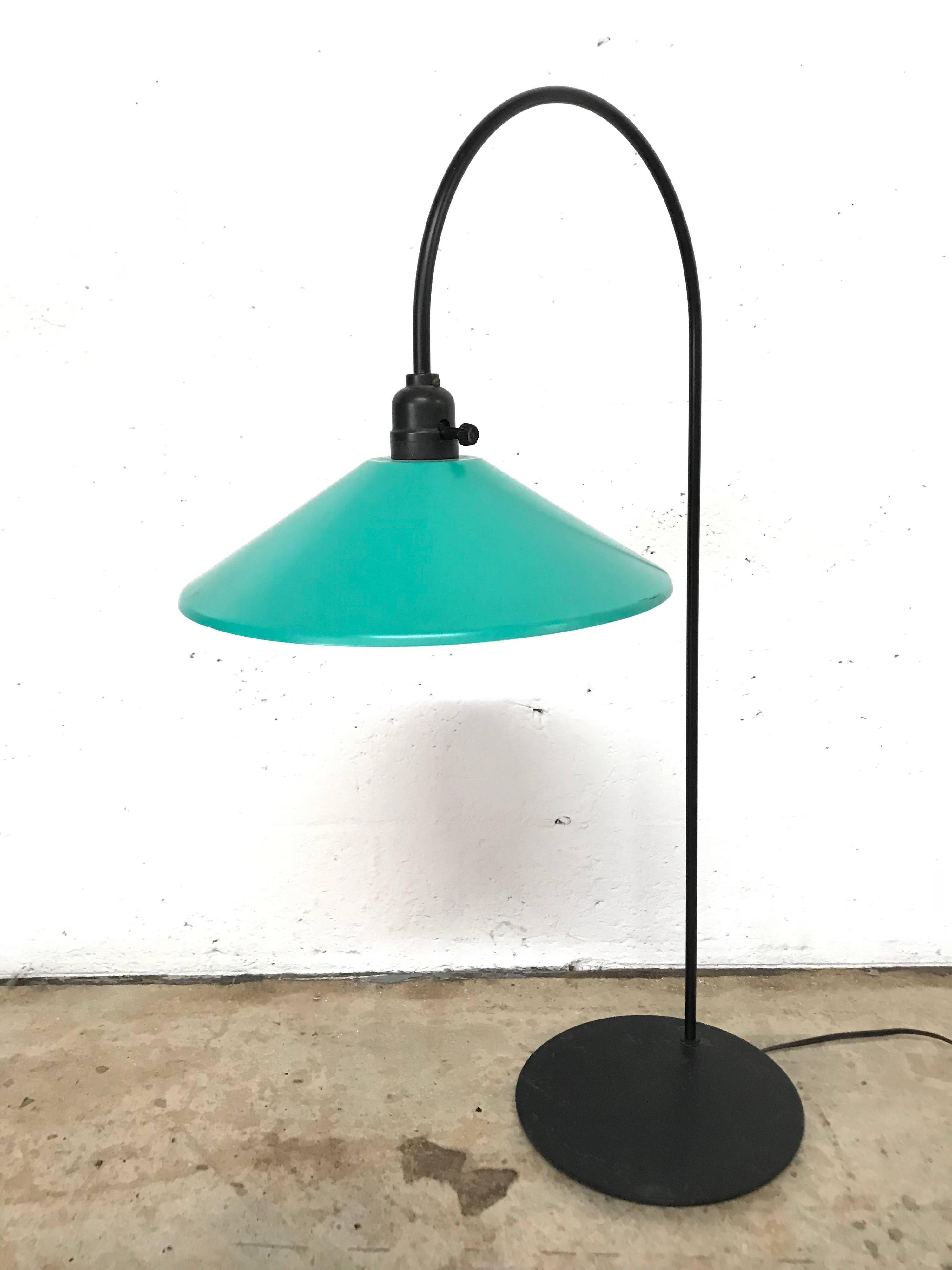 Postmodern arc lamp with black metal base and arch and a green shade, great Memphis style lamp.