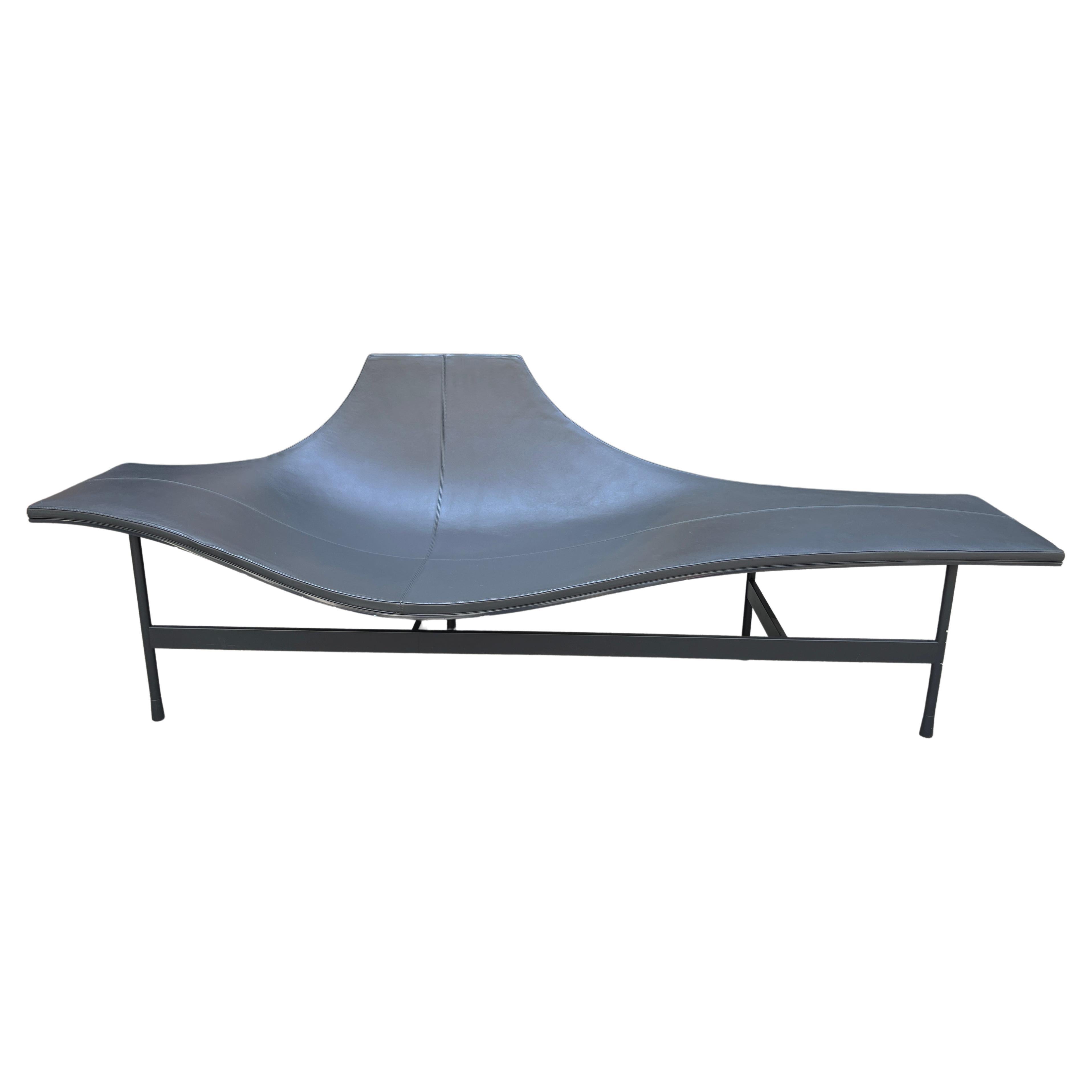Terminal 1 is a modern-day design classic. French designer Jean-Marie Massaud created this Chaise lounge for B&B Italia in 2008 that also functions as an armchair. Beautiful  fluid stingray shape looks light and airy. High gloss lacquered shell