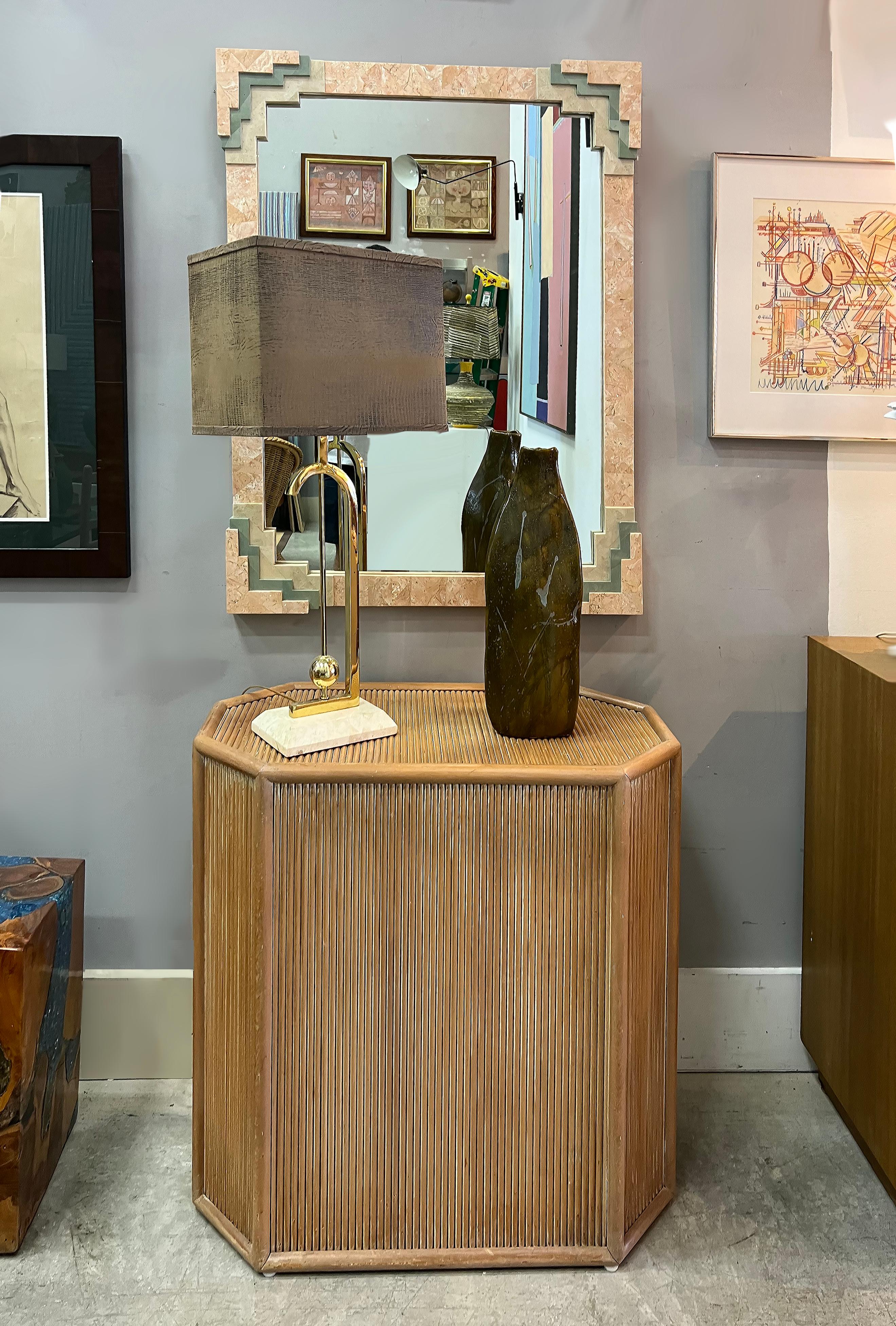 Post-modern Tessellated Stone Mirror, Maitland Smith Attributed

Offered for sale is a 1980s rare multi-color tessellated stone Maitland Smith mirror in a Post-modern design. The soft muted neutral stone hues allow the mirror to blend in with many