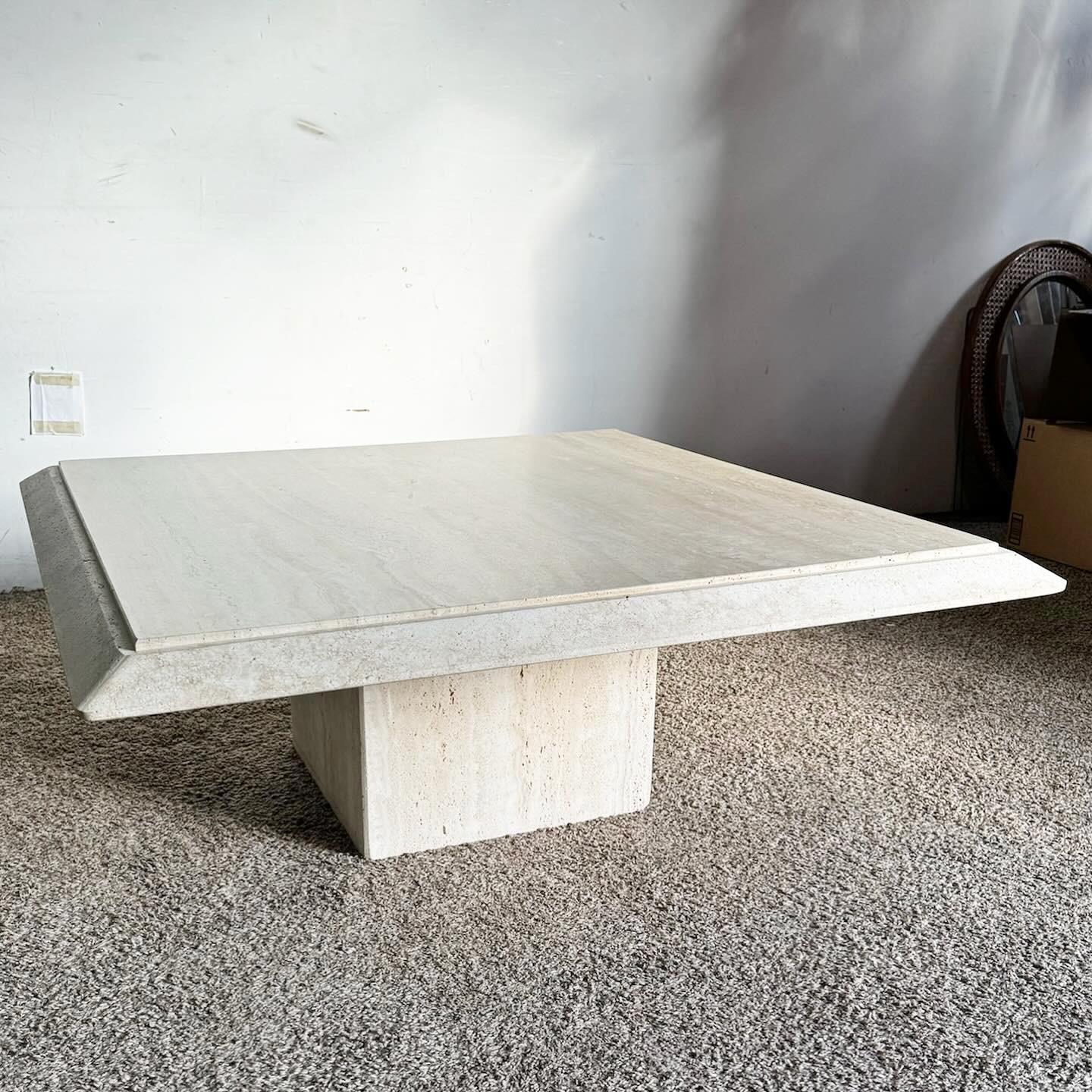 Elevate your living space with the Post-Modern Travertine Beveled Square Top Coffee Table. Crafted from exquisite travertine, this table features a beveled square top that beautifully highlights the stone's natural beauty and unique veining. Its
