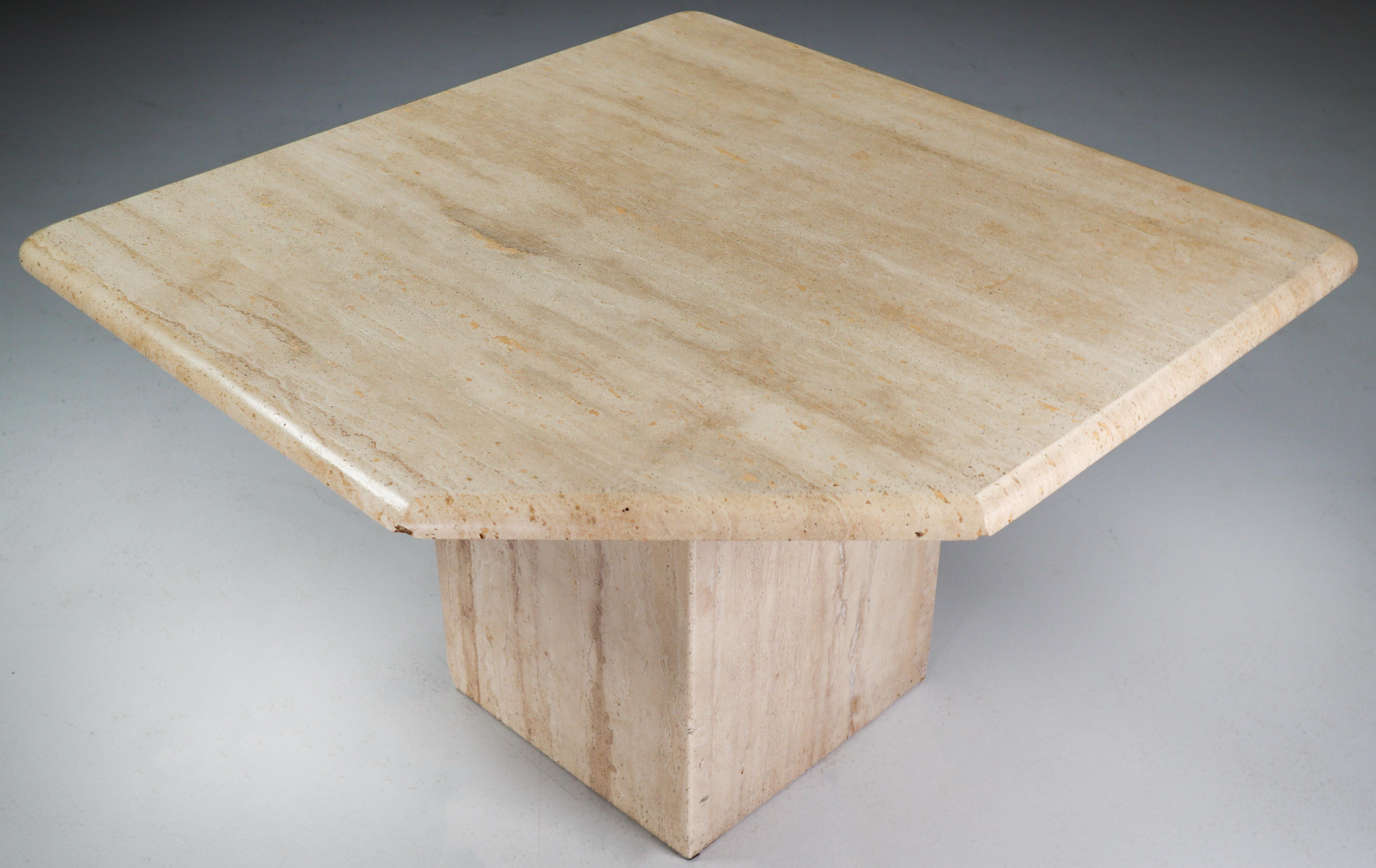 This beautiful post-modern travertine side - coffee table, circa 1970s, has beautiful graining and pentagonal top. This sculptural travertine side table would work great in a Traditional, Transitional, Hollywood Regency, classical or Art Deco room