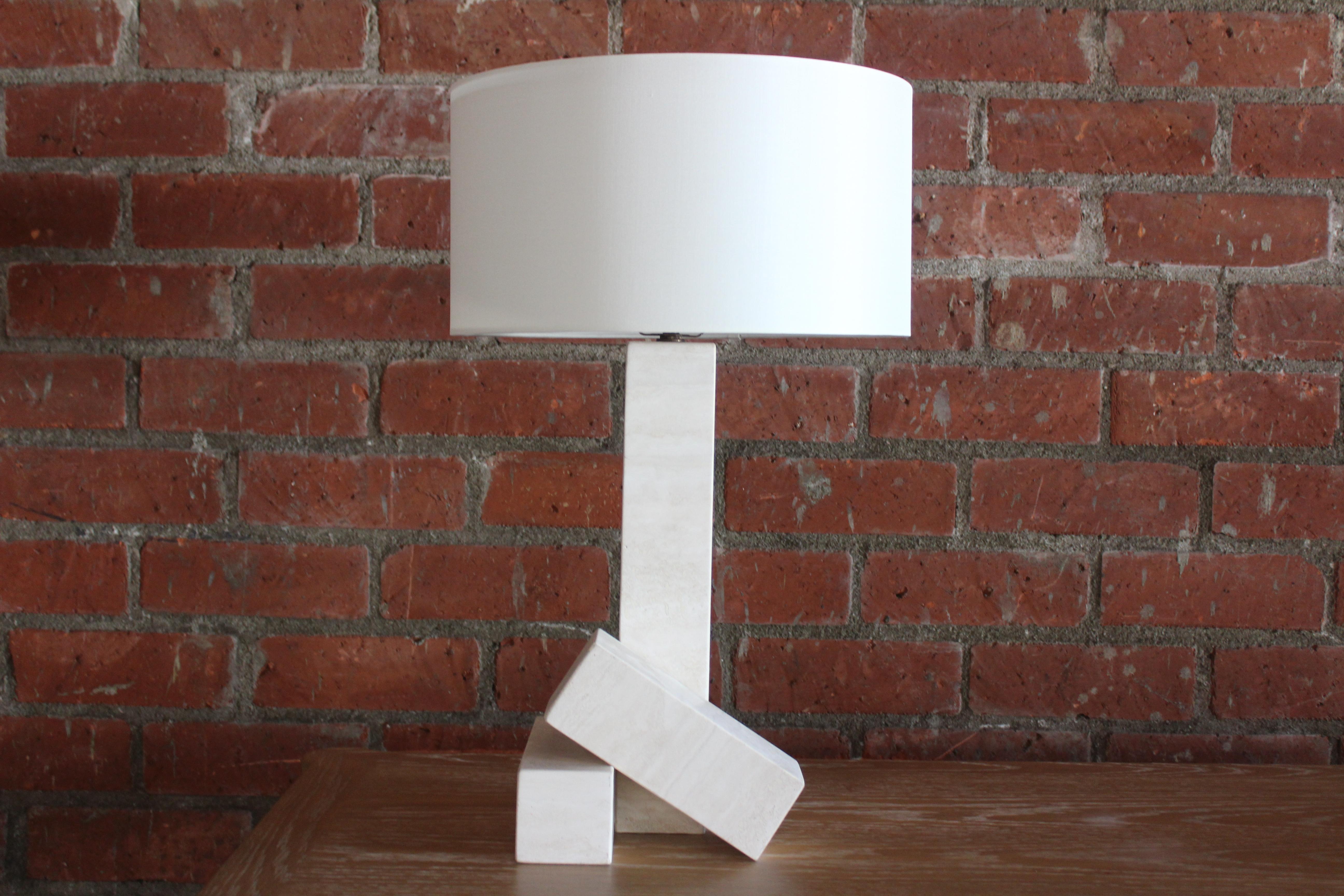 A vintage 1970s Italian post-modern table lamp in travertine. Newly rewired and fitted with a custom shade in silk. The travertine has a new honed finish.
