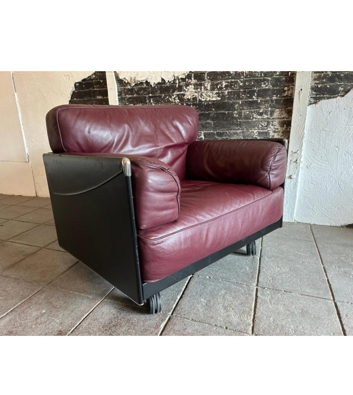 Post Modern Maroon “Twice” leather Lounge chair by Pierluigi Cerri for Poltrona Frau Italy, circa 1970. Low Modern designed lounge chair with 2 front caster and 2 rear legs - Very soft Maroon leather puffy cushions. Super comfortable chair with