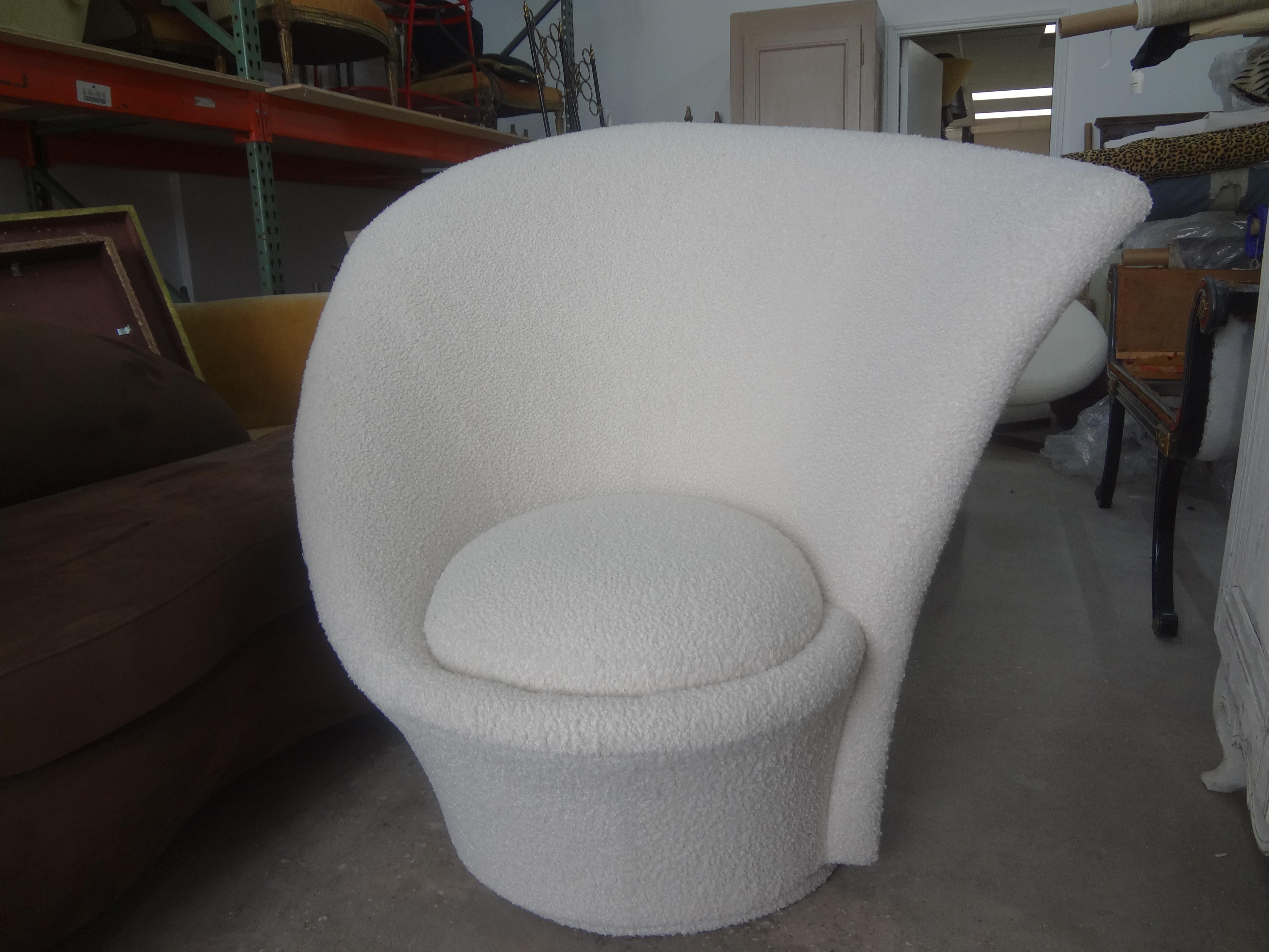 Post Modern Vladimir Kagan for Directional swivel lounge chair. This unusual iconic Kagan swivel chair has a high back and has been professionally upholstered in white boucle fabric. Very comfortable and stunning from every angle!