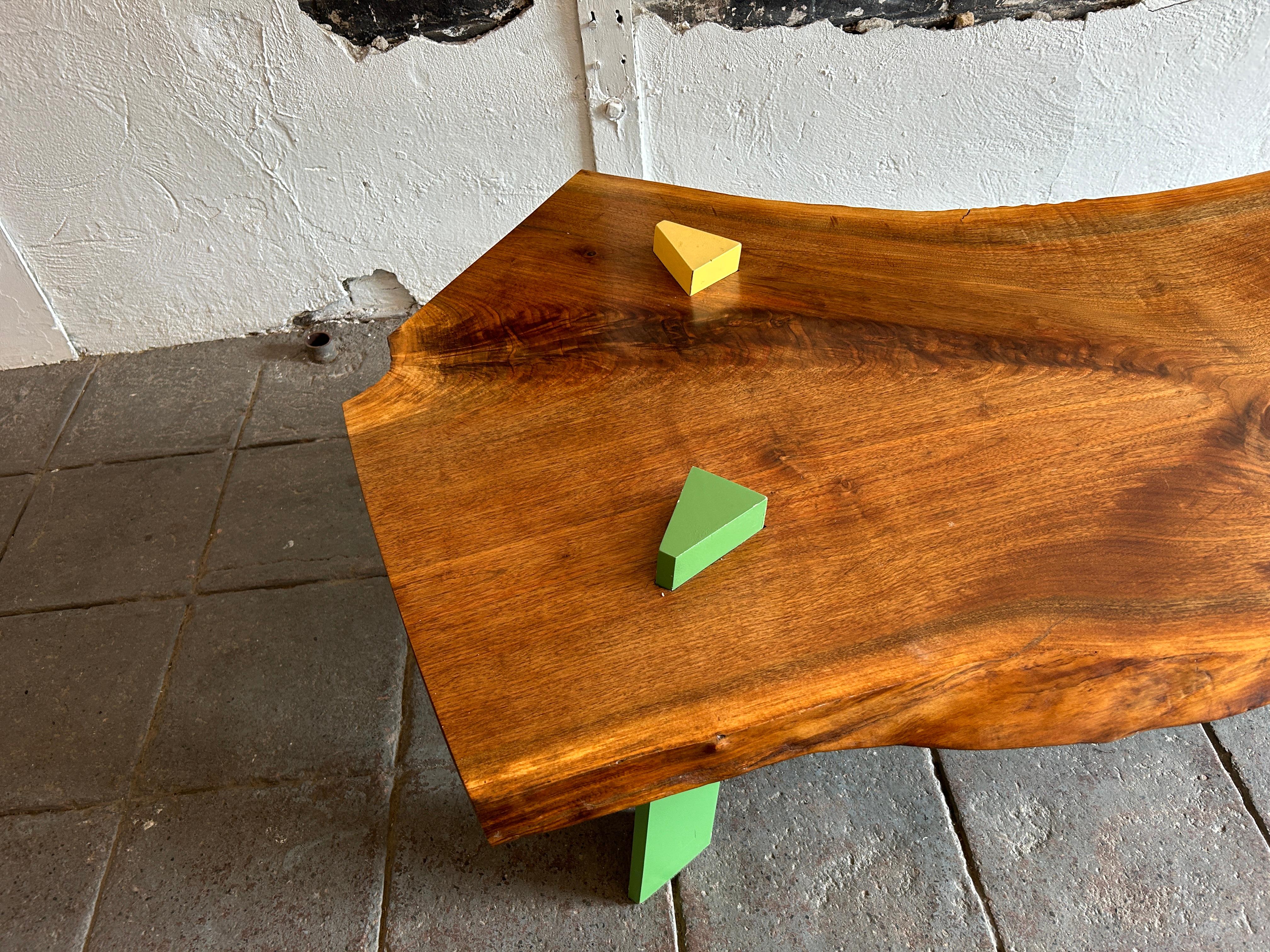 Post Modern Walnut Slab coffee table with colored triangle legs studio craft  In Good Condition For Sale In BROOKLYN, NY