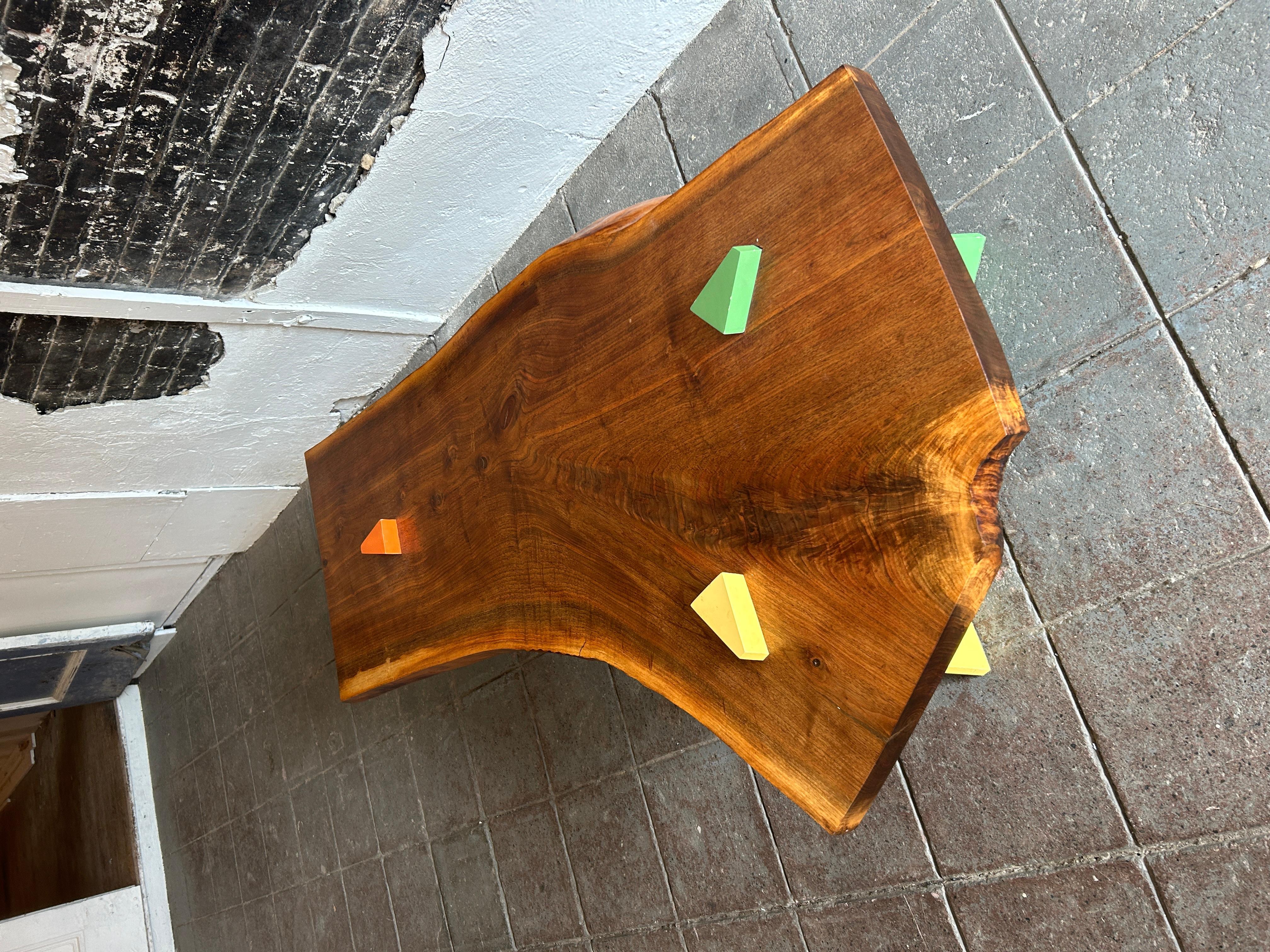 Post Modern Walnut Slab coffee table with colored triangle legs studio craft For Sale 1