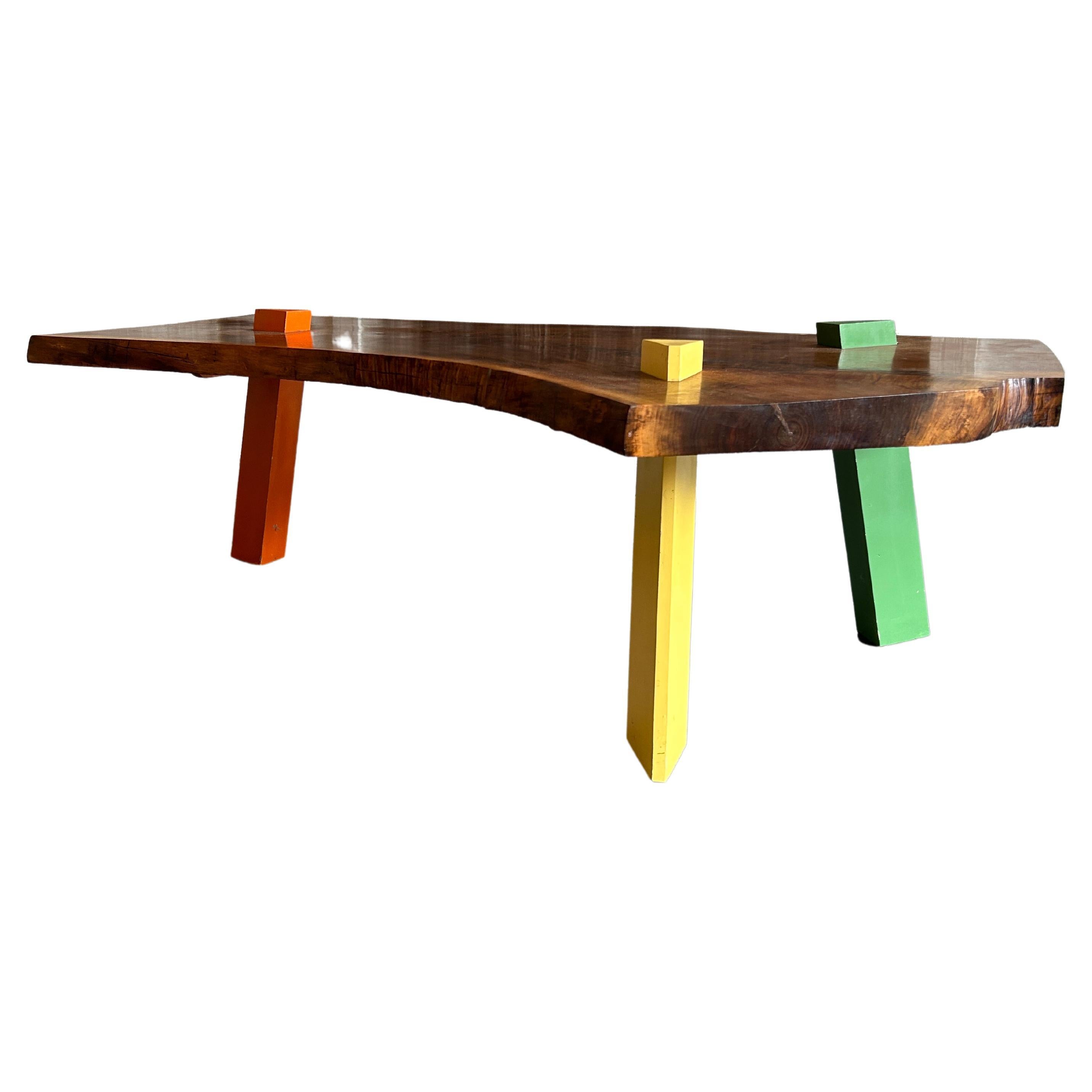 Post Modern Walnut Slab coffee table with colored triangle legs studio craft 