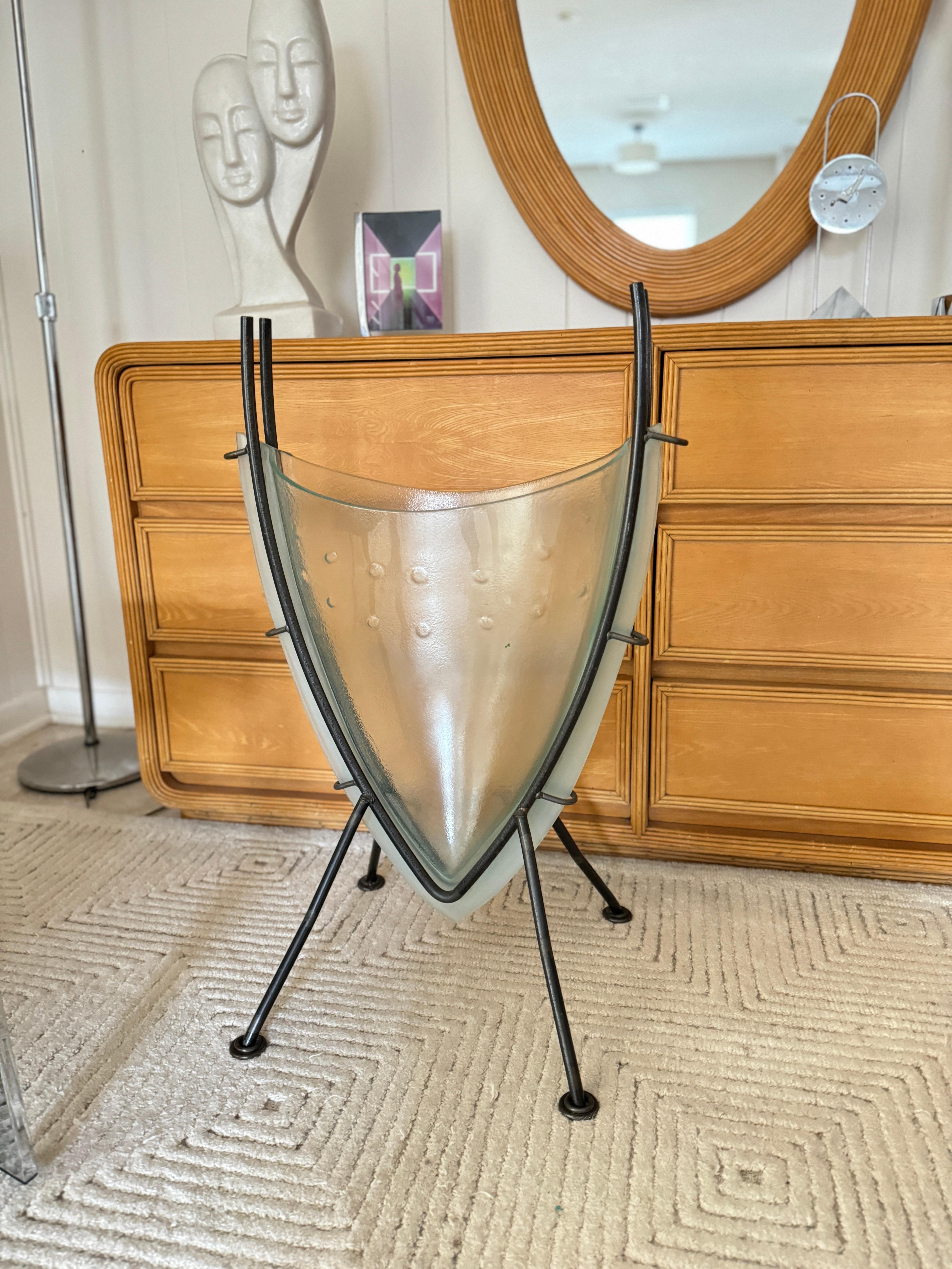 Post modern wrought iron plant stand with thick glass vase. Very heavy.  3