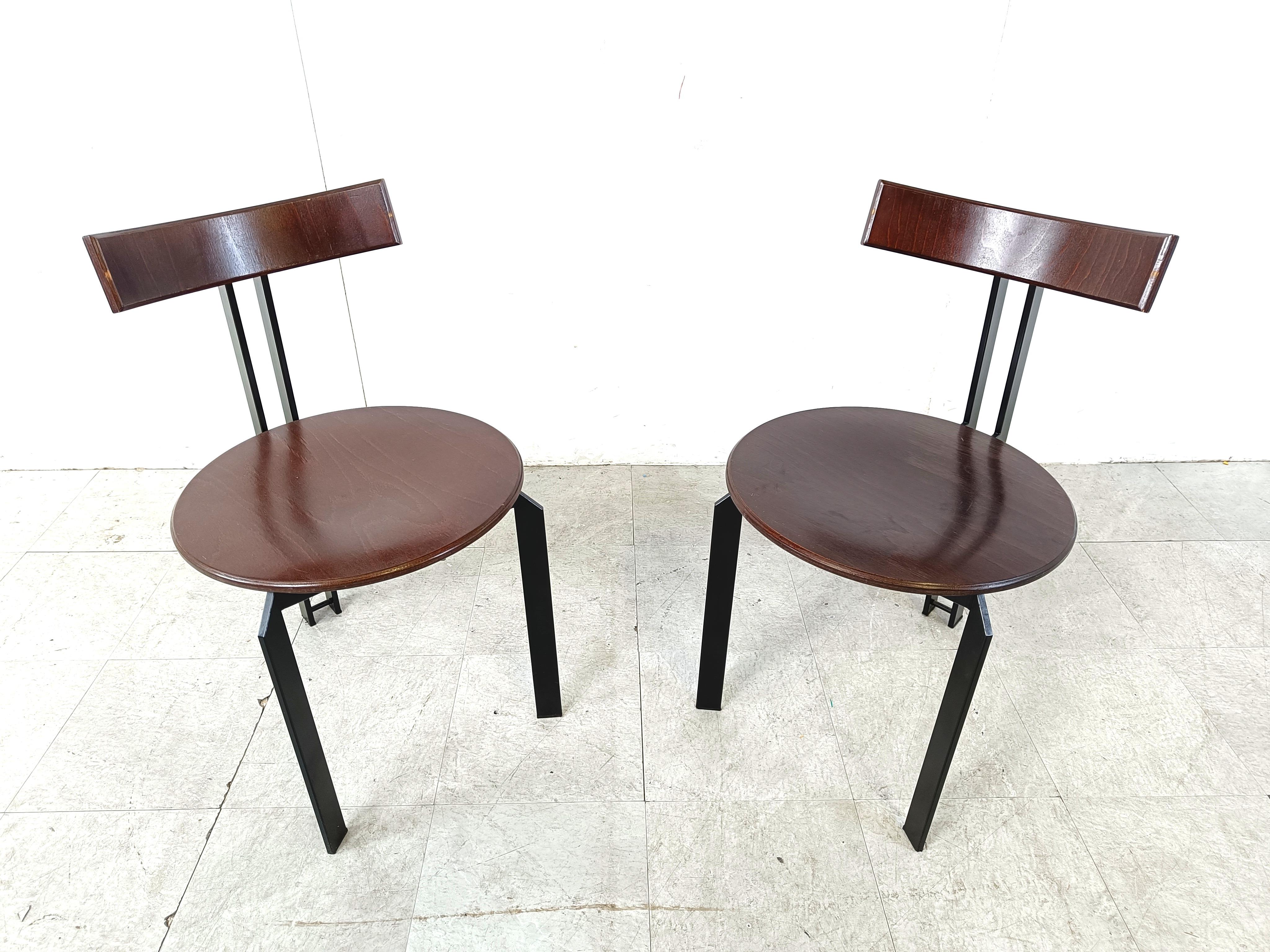 Vintage tripod post modern design dining chairs, model 'Zeta' designed by Martin Haksteen for Harvink.

The chairs have a tripod black lacquered metal frame with wooden szeat and curved backrest.

Beautiful timeless design.

Good condition -