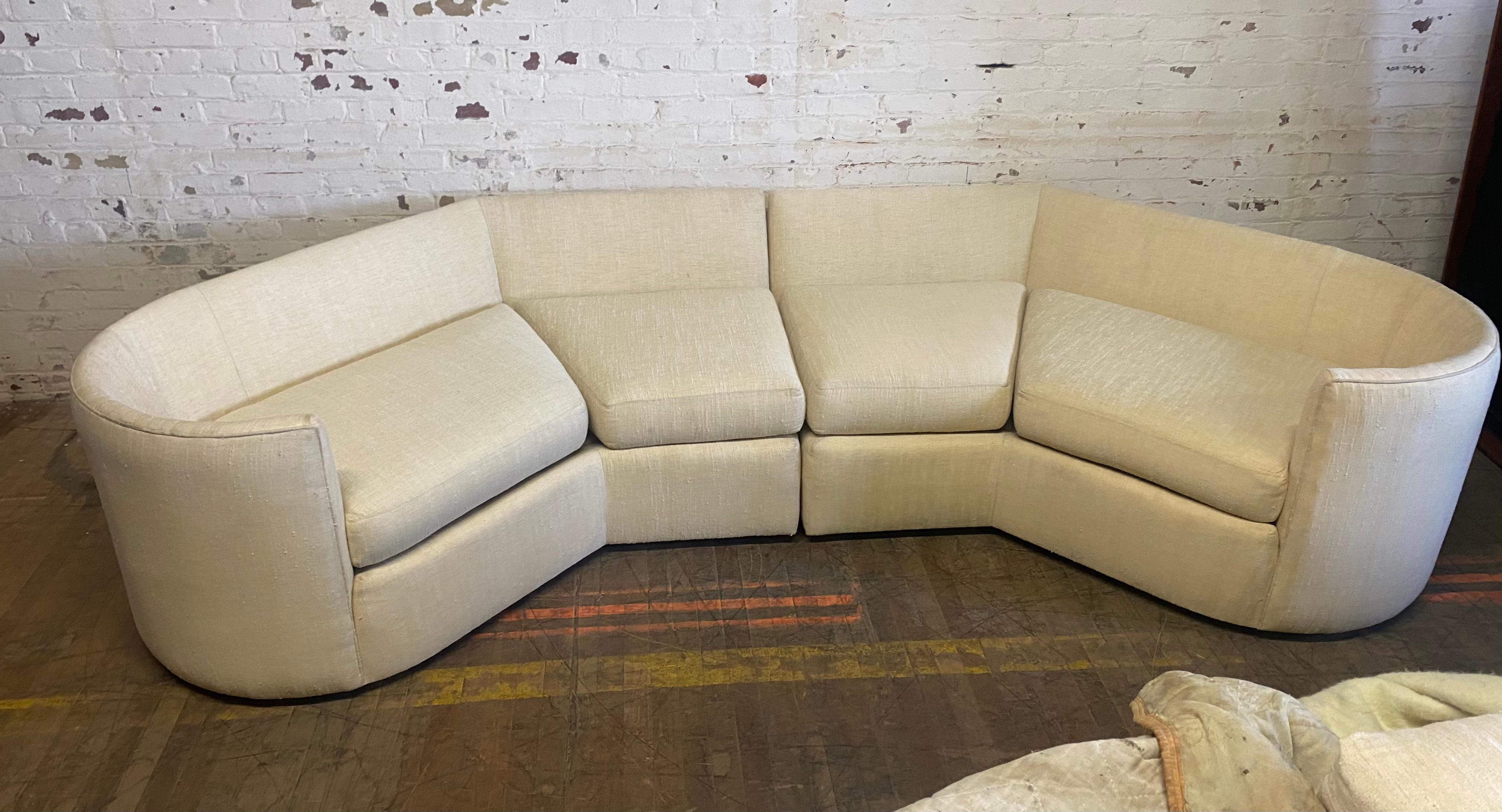 Stunning two piece sofa, Post Modernist design, Very reminiscent of designs by Vladimir Kagan, Milo Baughman, Noguchi etc, Extremely comfortable. Nice original condition, Coould use a good cleaning, Would be amazing reupholstered, Hand delivery