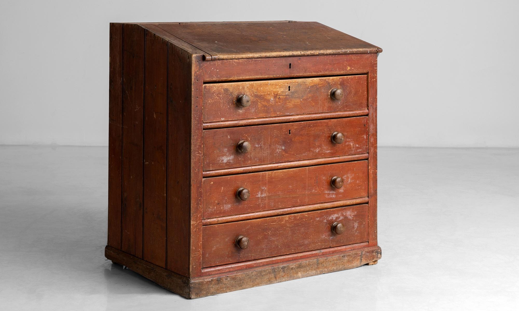 Post office drawers

England circa 1910

Four drawer chest with sloped top.

Measures: 34.75” L x 24.5” D x 36.75” H.