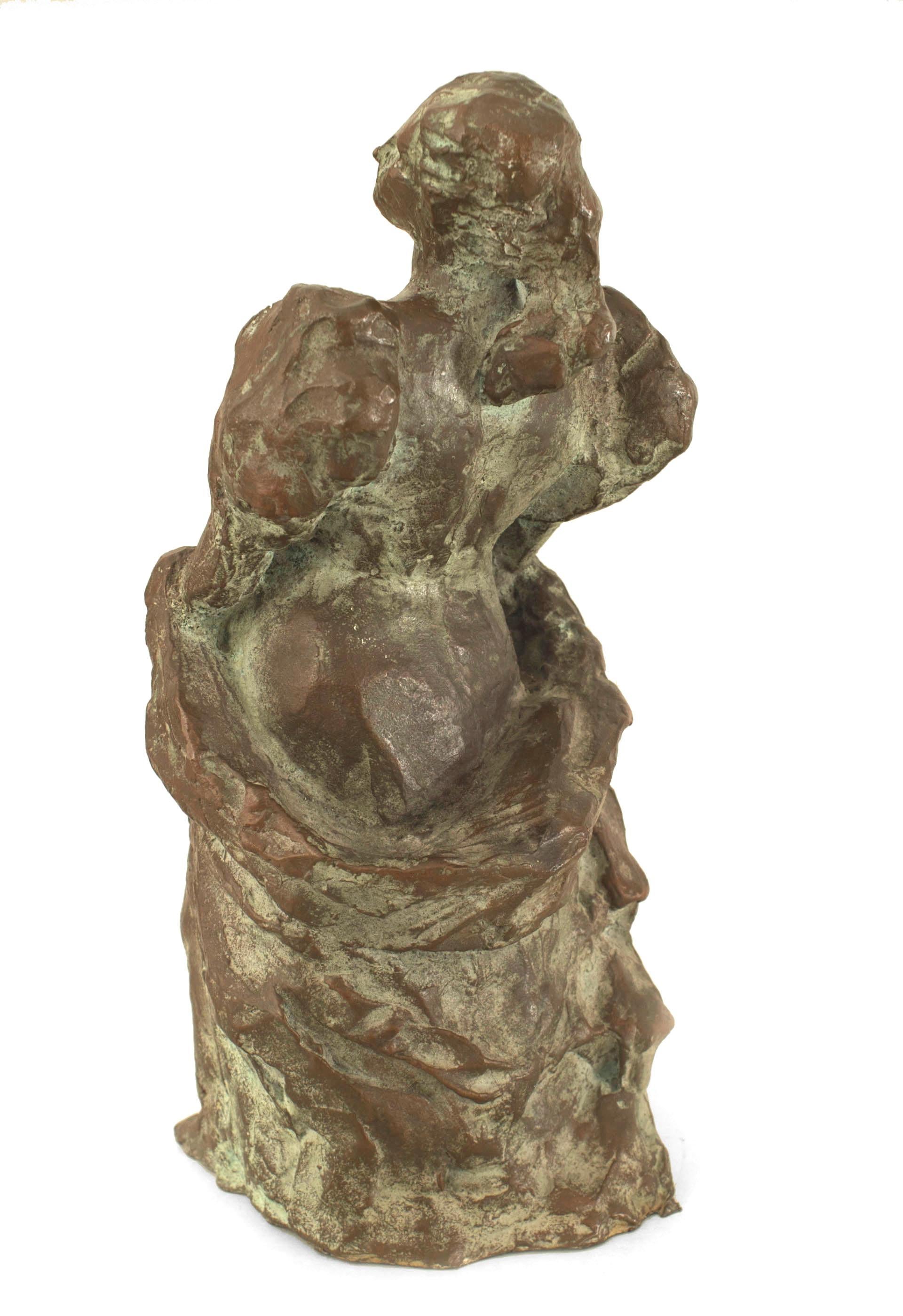 Dutch Post-War Design abstract bronze sculpture with a green patinated trimmed finish of a woman with a shawl wrapped around her waist (att: William Cowenberg 1970s).
  