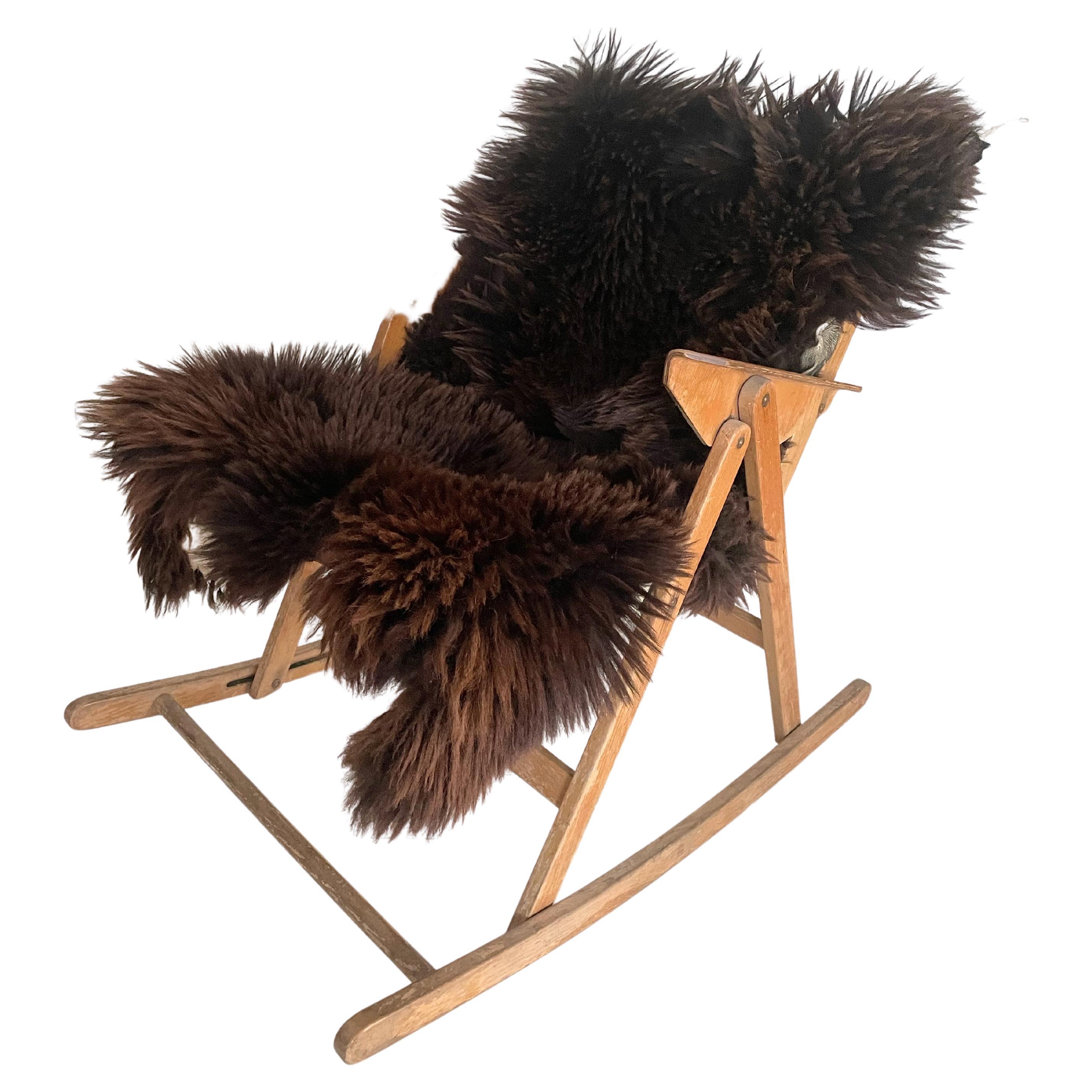 This model Rex folding rocking chair was designed by Niko Kralj in Slovenia in 1952, with this particular piece thought to have been produced during the 1960s.