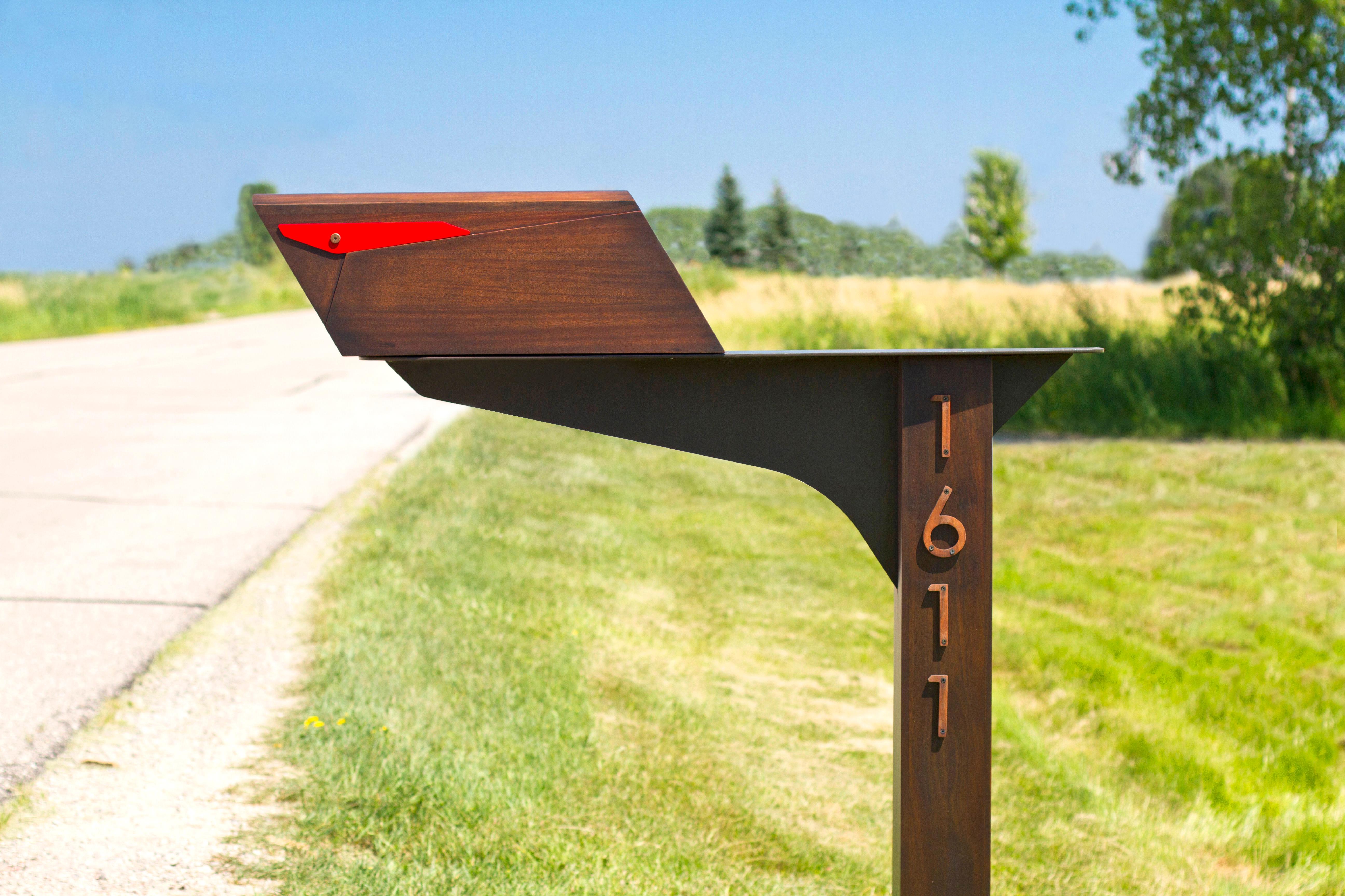 Mailboxes are in much need of redesign, and Wooda’s Postale fits the bill. Being that we are Wisconsin based and have to deal with winter, we decided to cantilever our mailbox far from the post to allow ample room for snow plows, while also placing