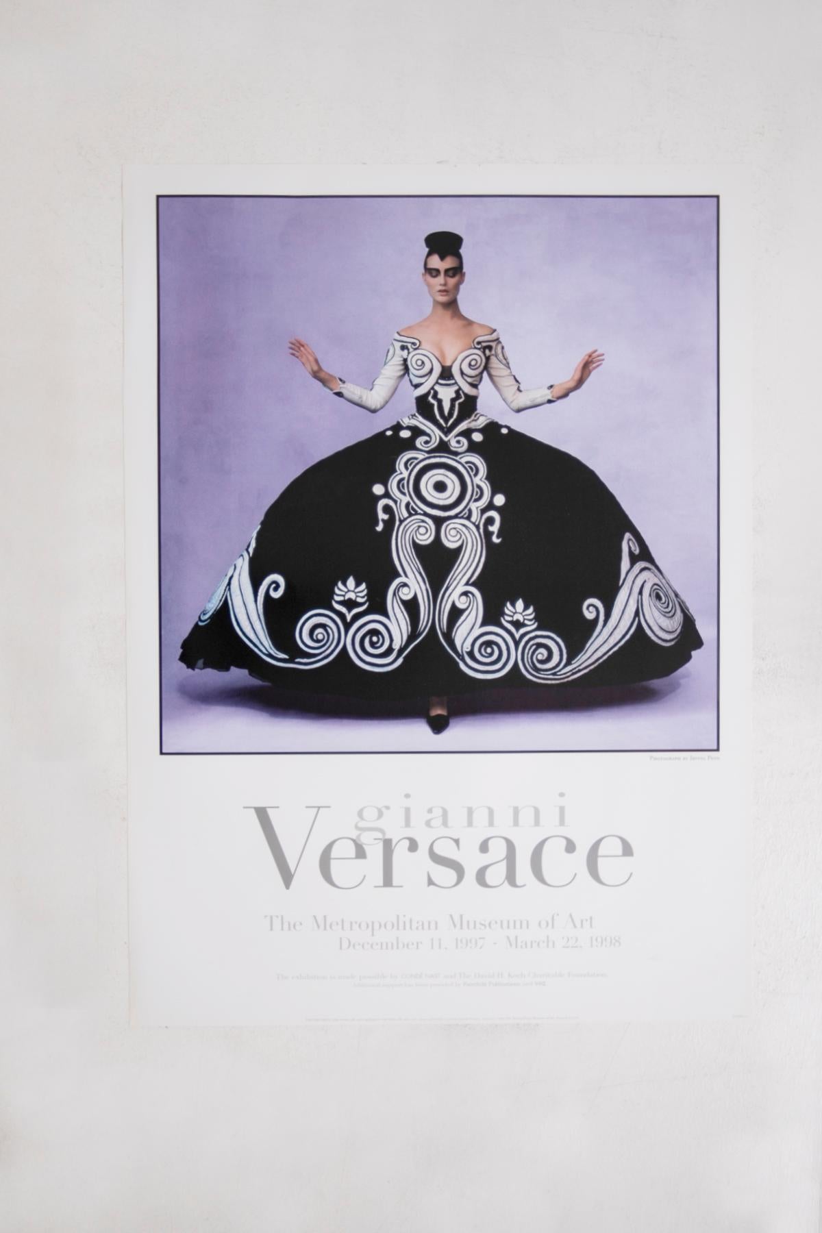 GIANNI Versace. Beautiful and rare Poster of the Metropolitan Museum of Art December 1997-March 1998 of the exhibition on Gianni Versace. The poster depicts a photograph by Irving Penn. Penn's photograph depicts the famous 1987 theatre costume in